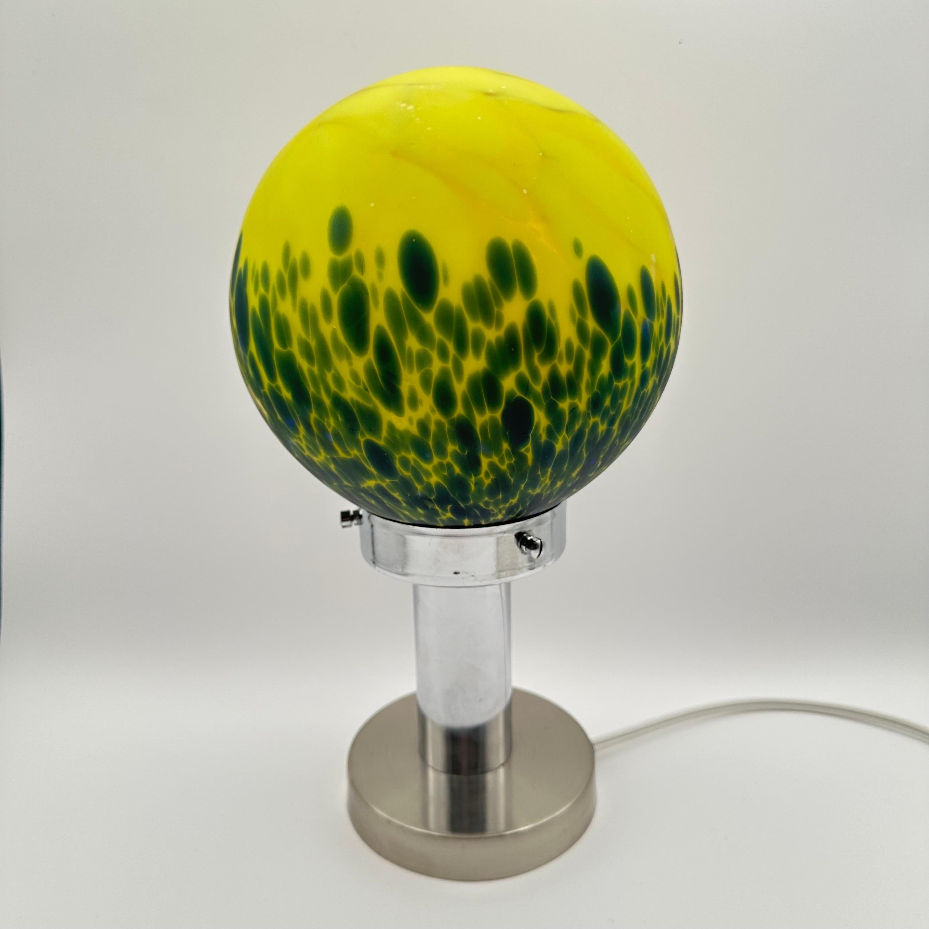 Mid-20th Century Vintage Art Deco Glass and Chrome Table Lamp with Bright Yellow and Green Globe For Sale