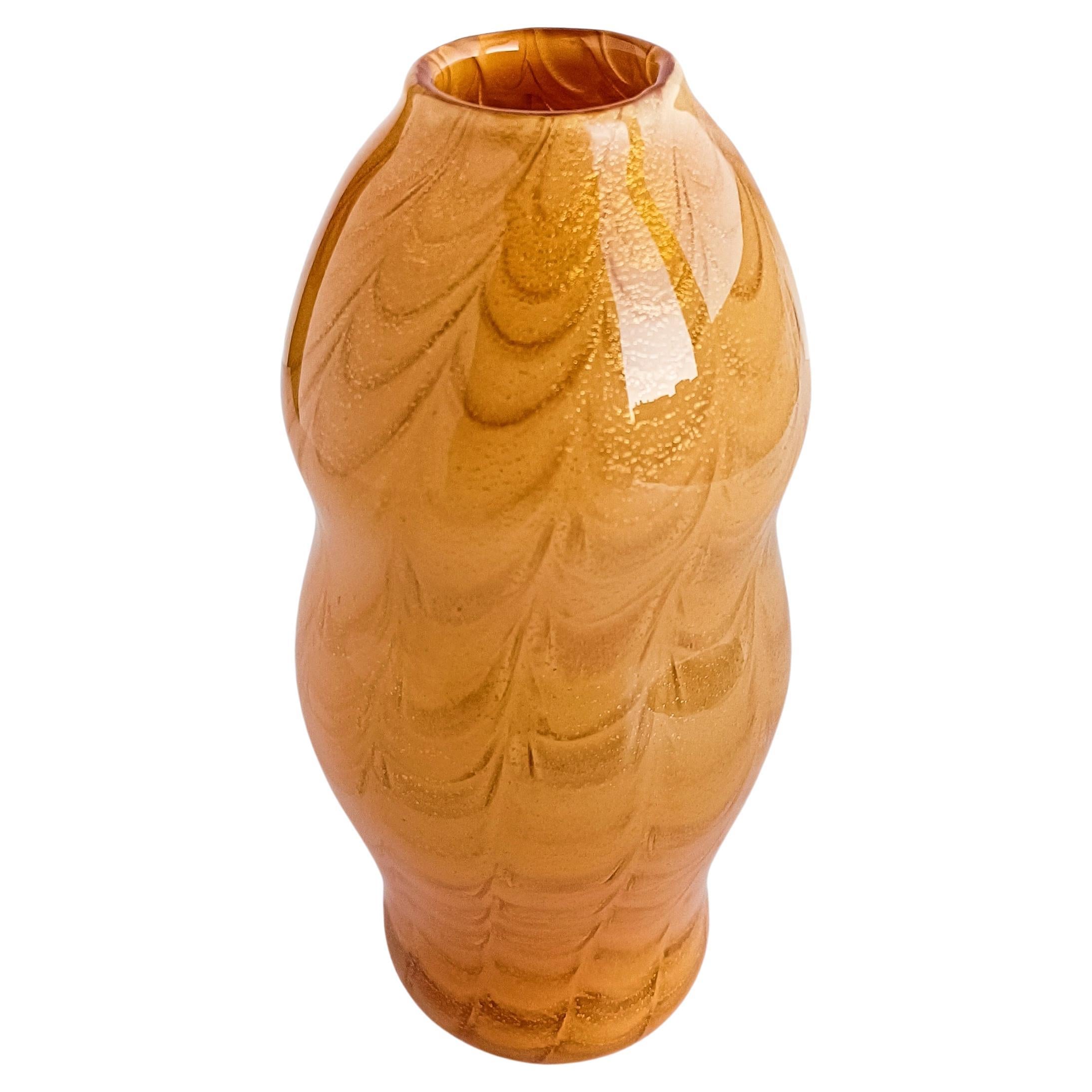 Step into the lavish world of Art Deco elegance with this exquisite Murano glass vase, a timeless masterpiece handcrafted in the Murano island, near Venice, during the opulent 1980s. This striking piece is a testament to the unparalleled skill and