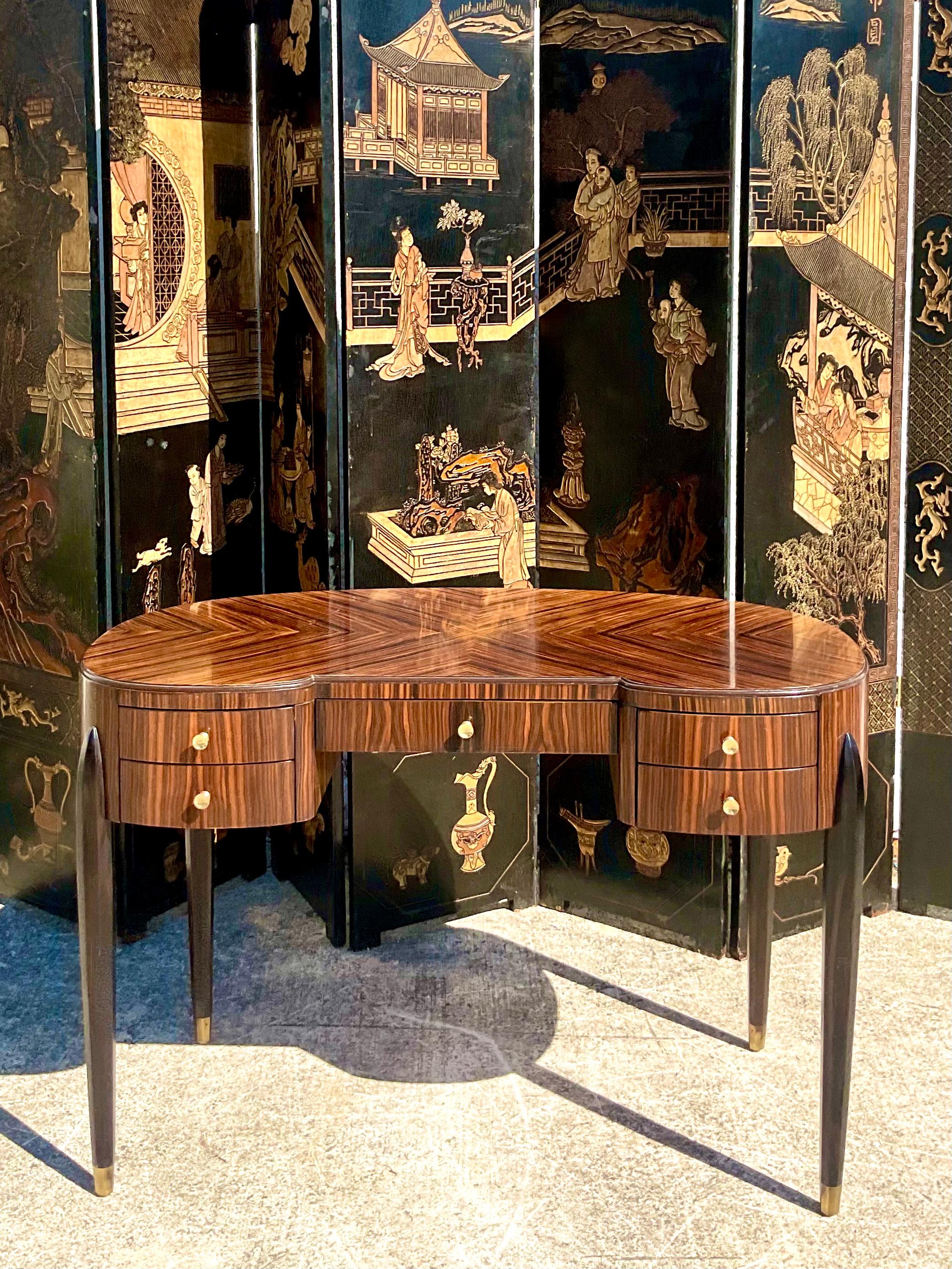 Fantastic vintage Henredon writing desk. Beautiful exotic zebra wood frame with black painted legs. Acquired from a Palm Beach estate.