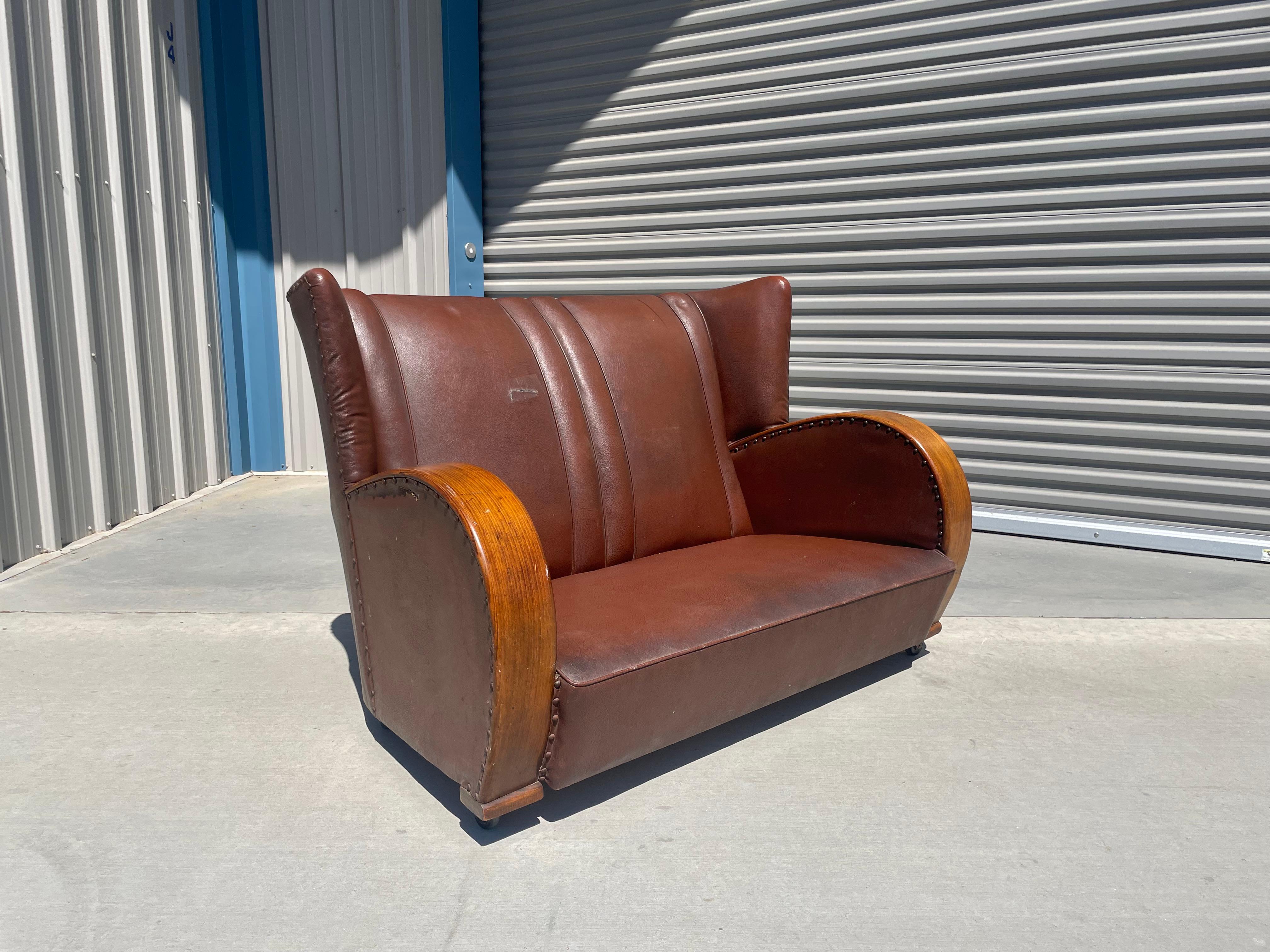 American Vintage Art Deco Leather Loveseat For Sale