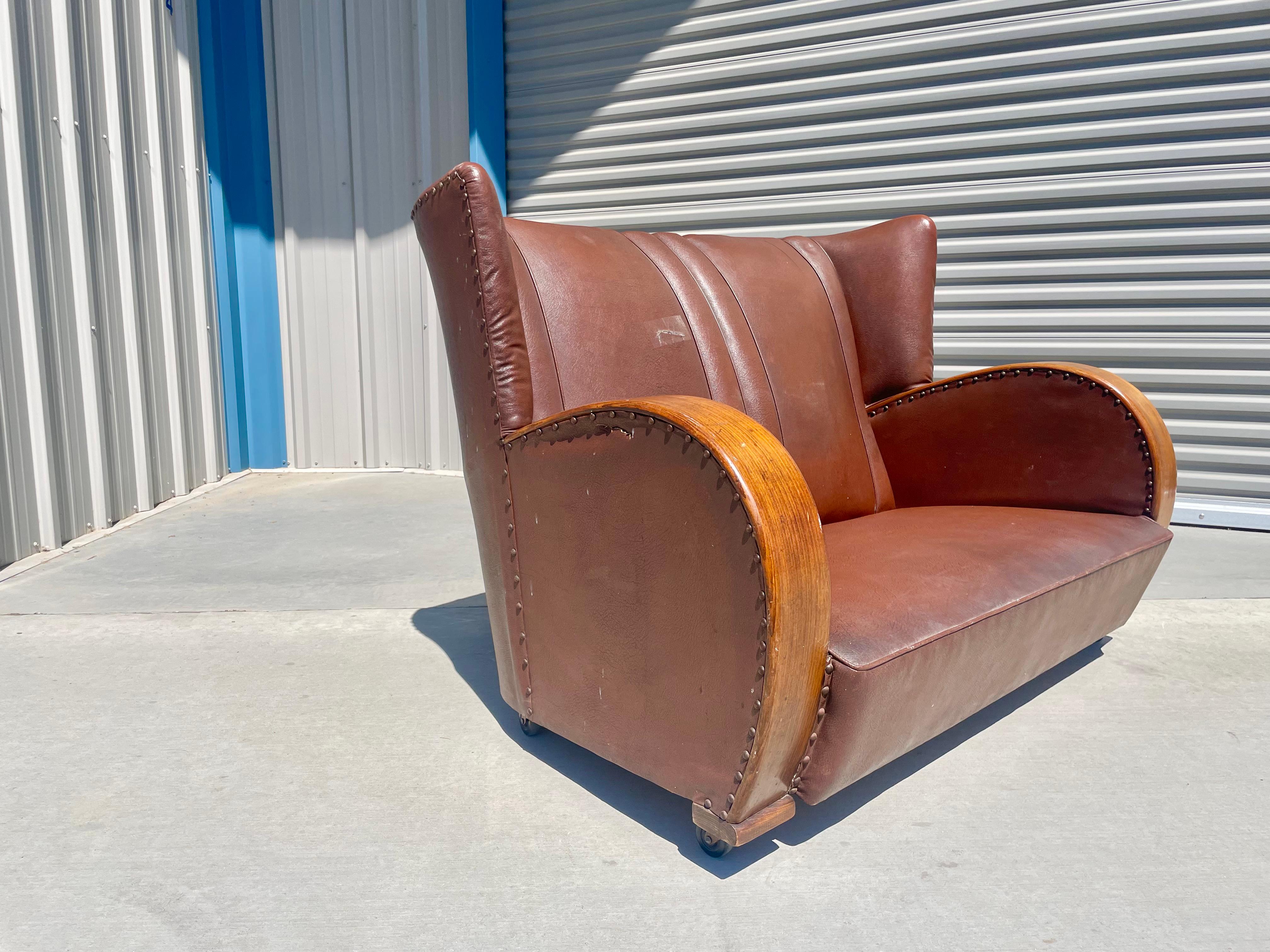 Vintage Art Deco Leather Loveseat In Fair Condition For Sale In North Hollywood, CA