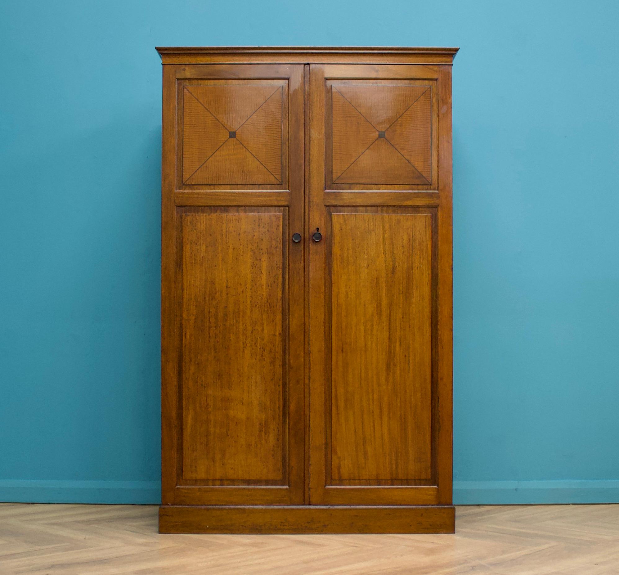 A Heal and Son Art Deco fitted out mahogany wardrobe
Featured in the 1936 Heals catalogue - named 'The Orderly'
Most probably designed by Ambrose Heal - due to the piece having a name as opposed to just a number in the catalogue - and shares some