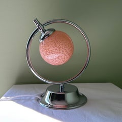 Vintage Art Deco Modernist Style Chrome and Pink Glass Saturn Globe Table Lamp