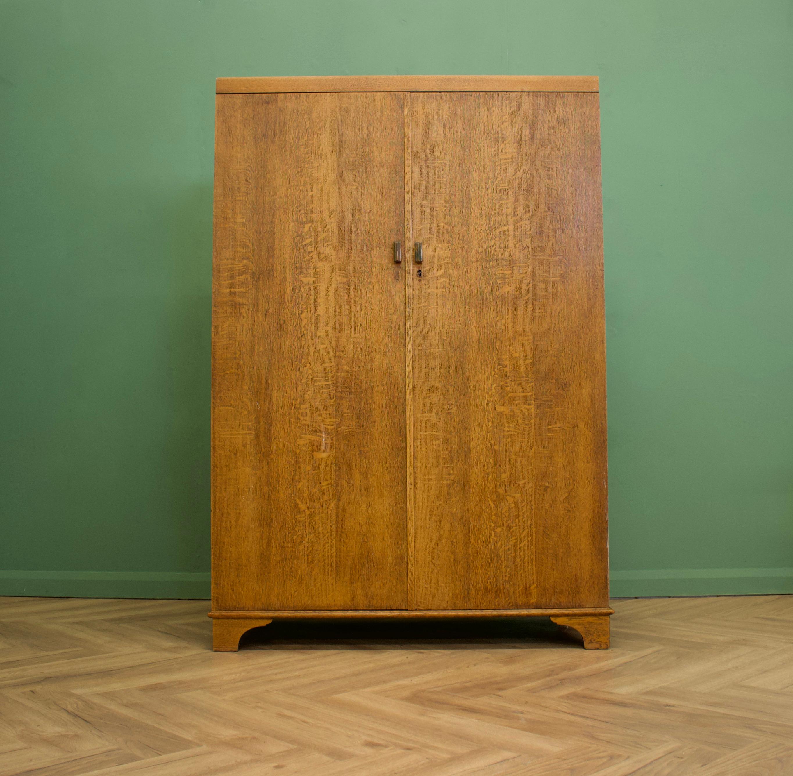 - Vintage Oak Compactum style gents wardrobe from Fitrobe
- Features a hanging rail, shoe rail, drawers and compartments.