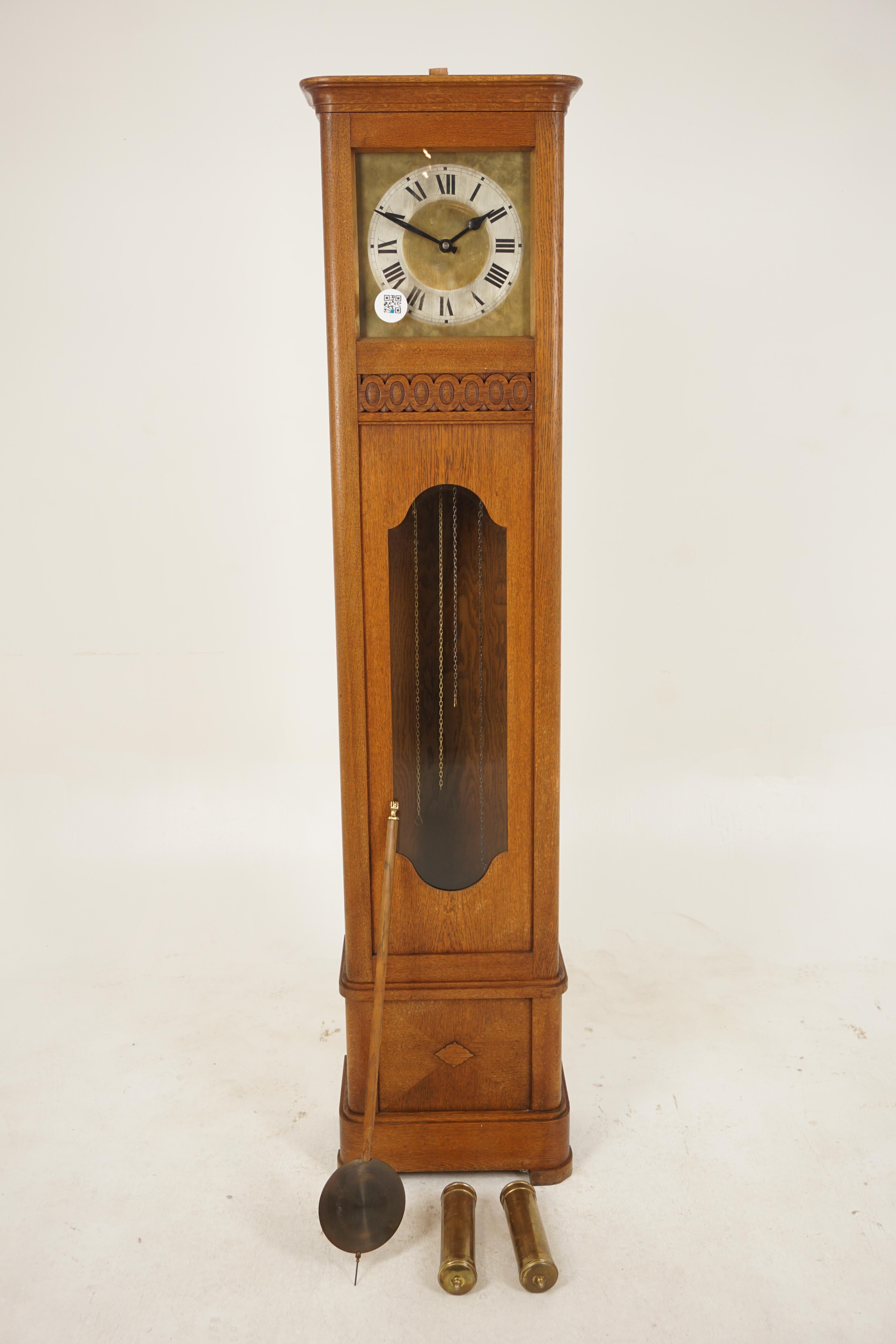Vintage Art Deco Oak Grandfather clock, long case clock, Scotland 1930, H131

Scotland 1930
Solid Oak
Original Finish
On eight day striking movement 
Carved oak case
Silver and brass dial with roman numerals
Glass front door opens to reveal a pair
