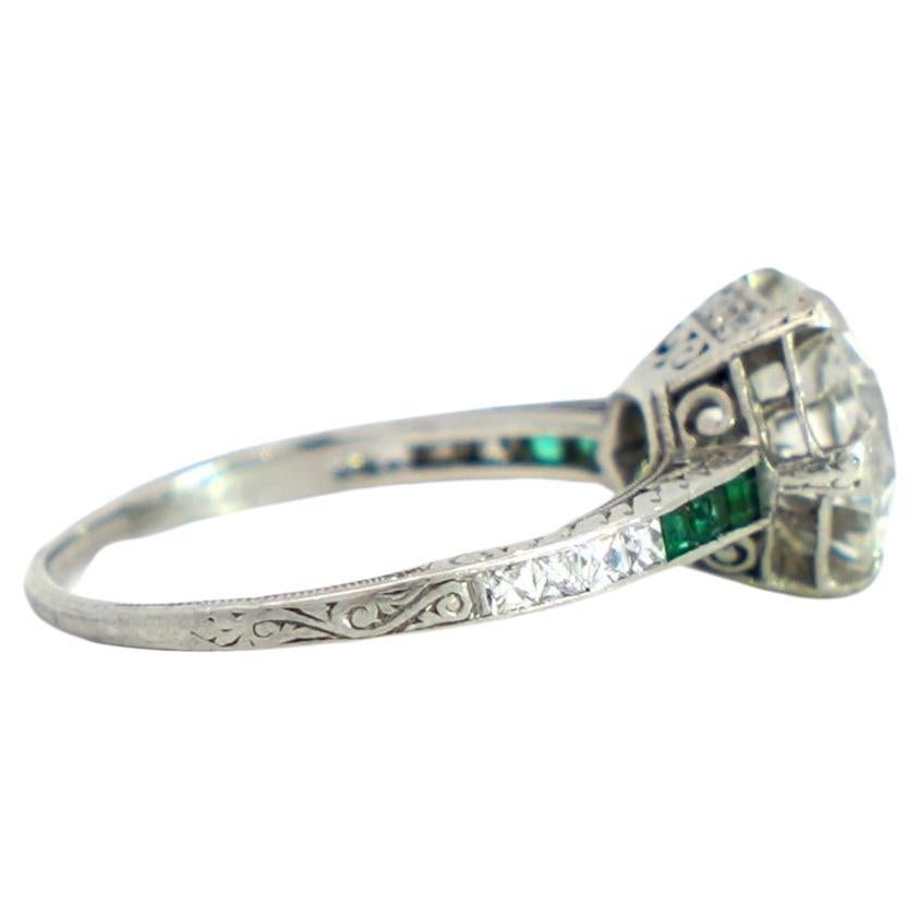 Women's Vintage Art Deco Old European Cut Diamond and Emerald Platinum Engagement Ring For Sale