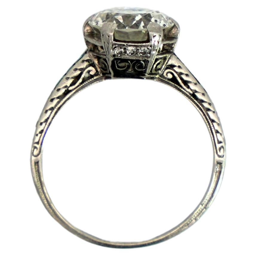 Vintage Art Deco Old European Cut Diamond and Emerald Platinum Engagement Ring For Sale 2