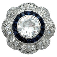 Vintage Art Deco Old European Cut Diamond and Sapphire Flower Ring in Platinum
