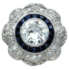 Vintage Art Deco Old European Cut Diamond and Sapphire Flower Ring in Platinum
