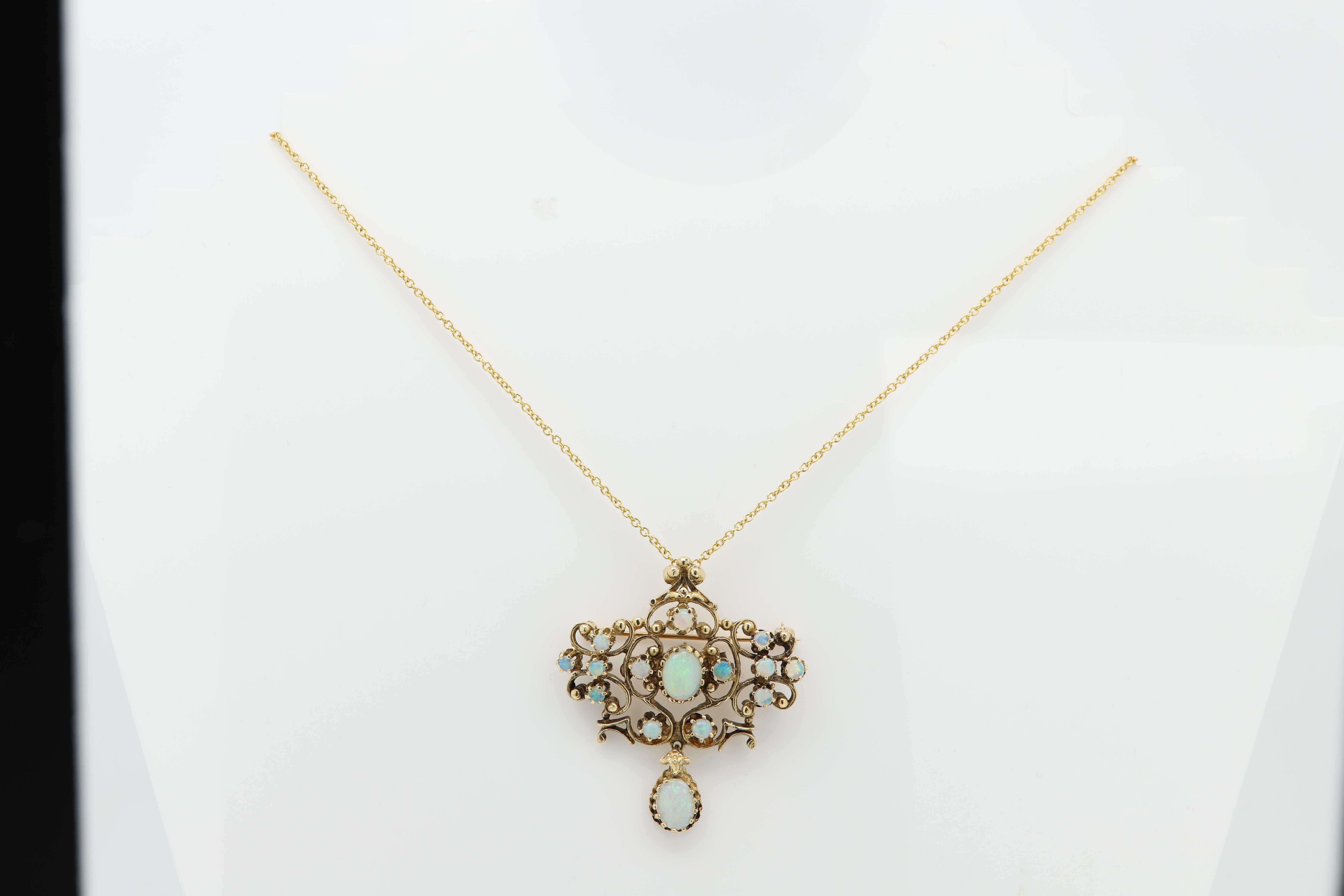 Vintage Art Deco Opal Necklace / pin
Hand crafted From the 1940's
Brilliant opal colors
was originally a brooch pin that was later converted to a necklace.
both options are still functioning
Approx size 1.5' x 1.5' inch
14K Yellow Gold 12.20