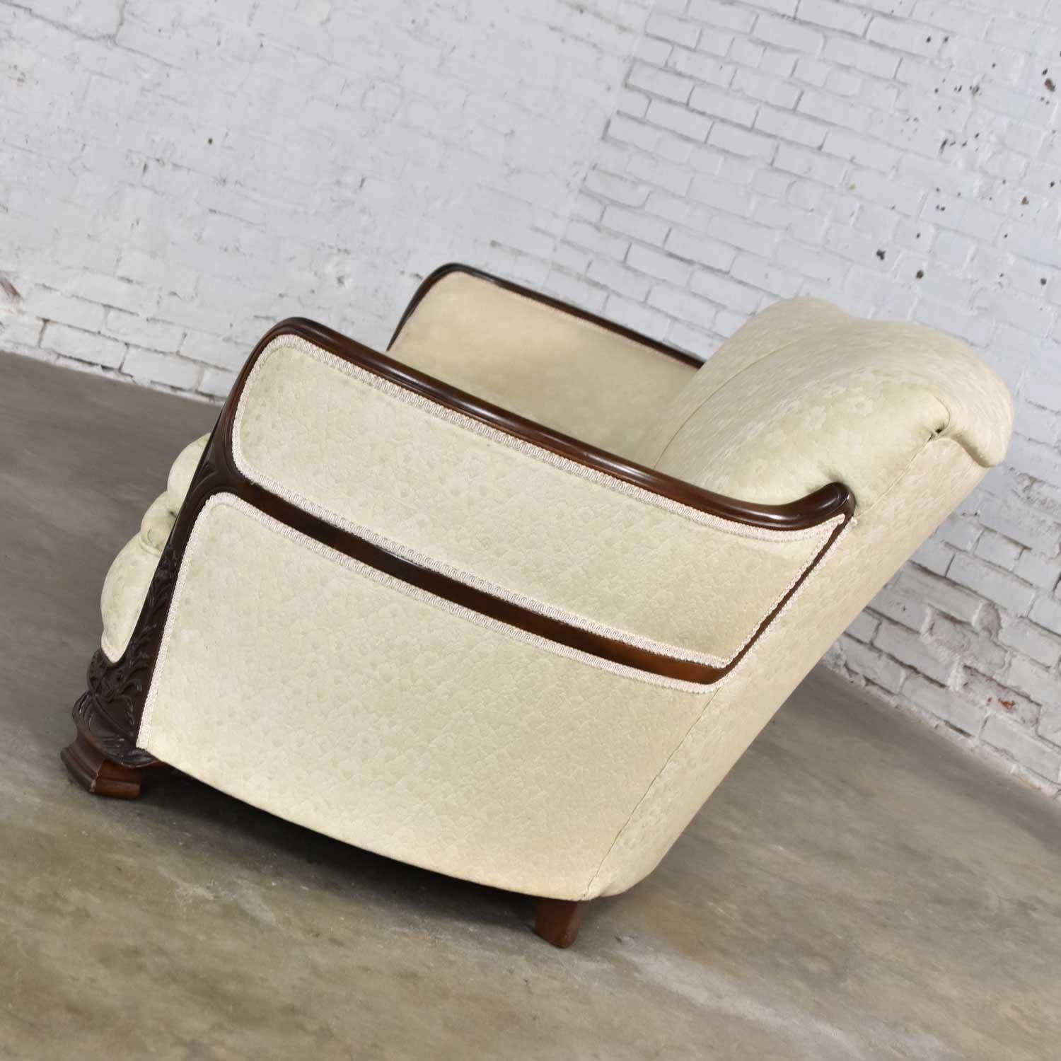 Fabulous vintage art deco or art nouveau sofa from Vargas Fine Furniture a long-established high-end furniture store in Topeka Kansas which is no longer in existence. It is comprised of wood frame and carved walnut details in its original, but very