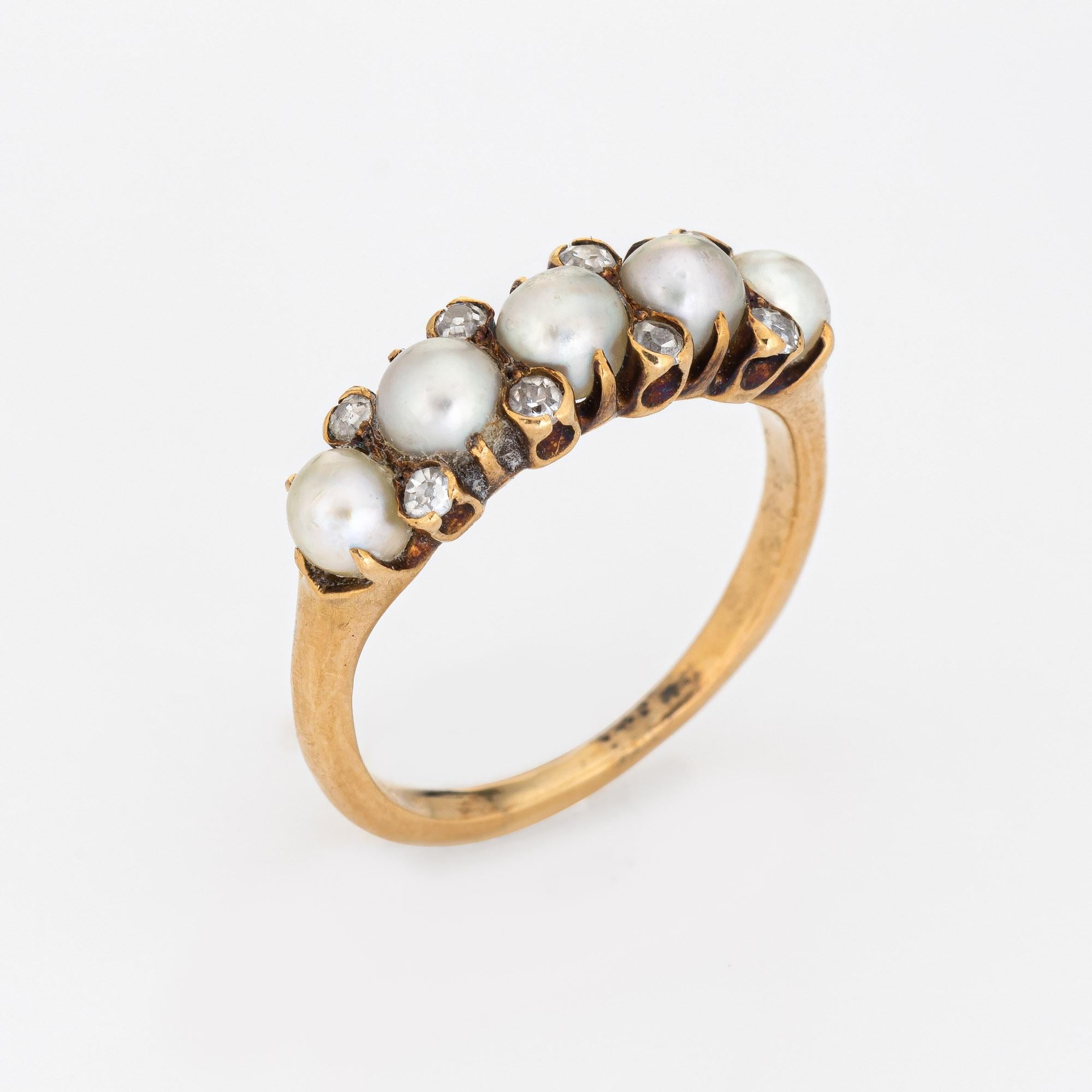 Finely detailed vintage Art Deco diamond ring (circa 1920s to 1930s) crafted in platinum. 

8 old single cut diamonds total an estimated 0.08 carats (estimated at H-I color and SI1-I2 clarity). Five cultured pearls measure 3mm. The pearls are well