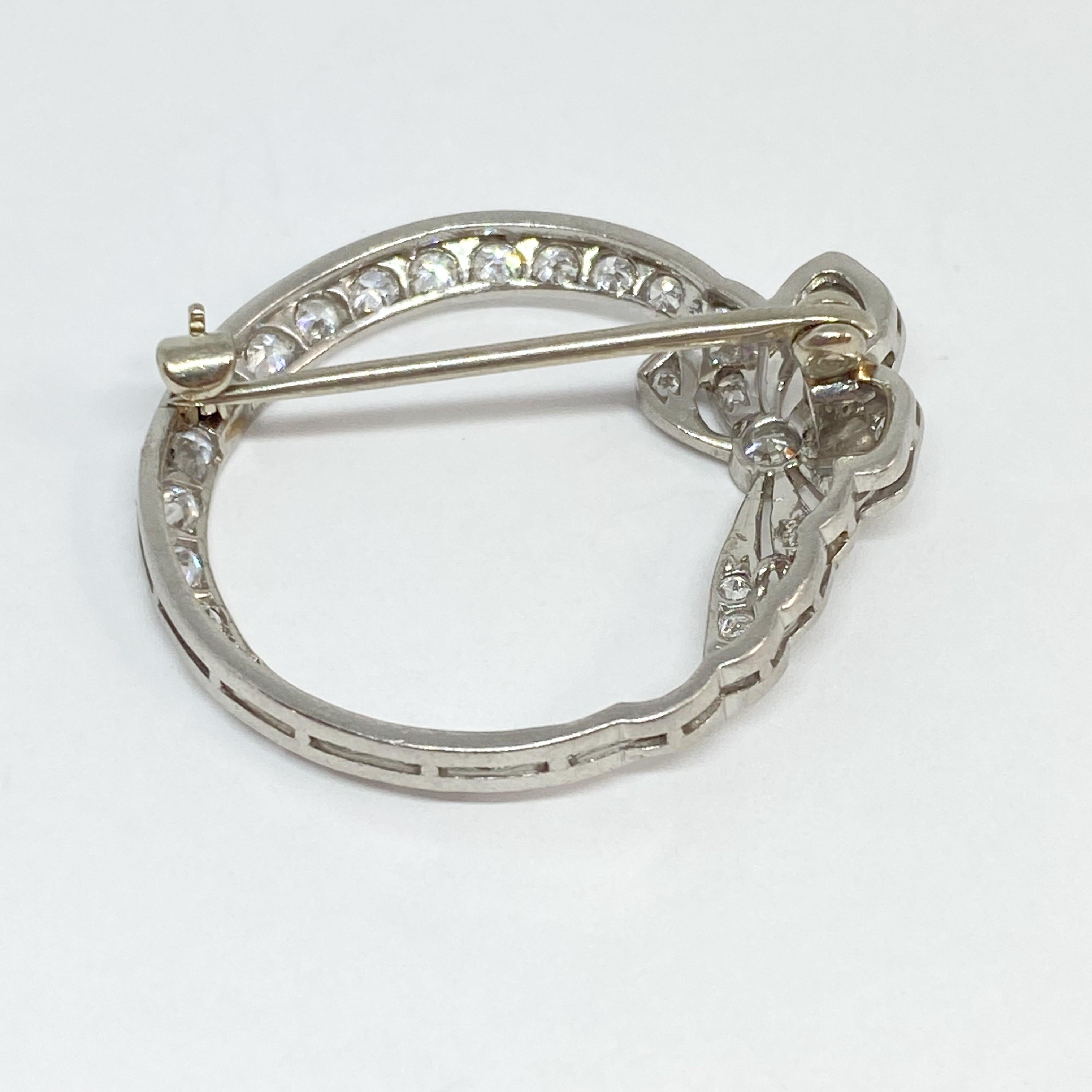 Vintage Art Deco Platinum Filigree Brooch Circle with Ribbon 1.45 Carat In Excellent Condition In Carmel-by-the-Sea, CA