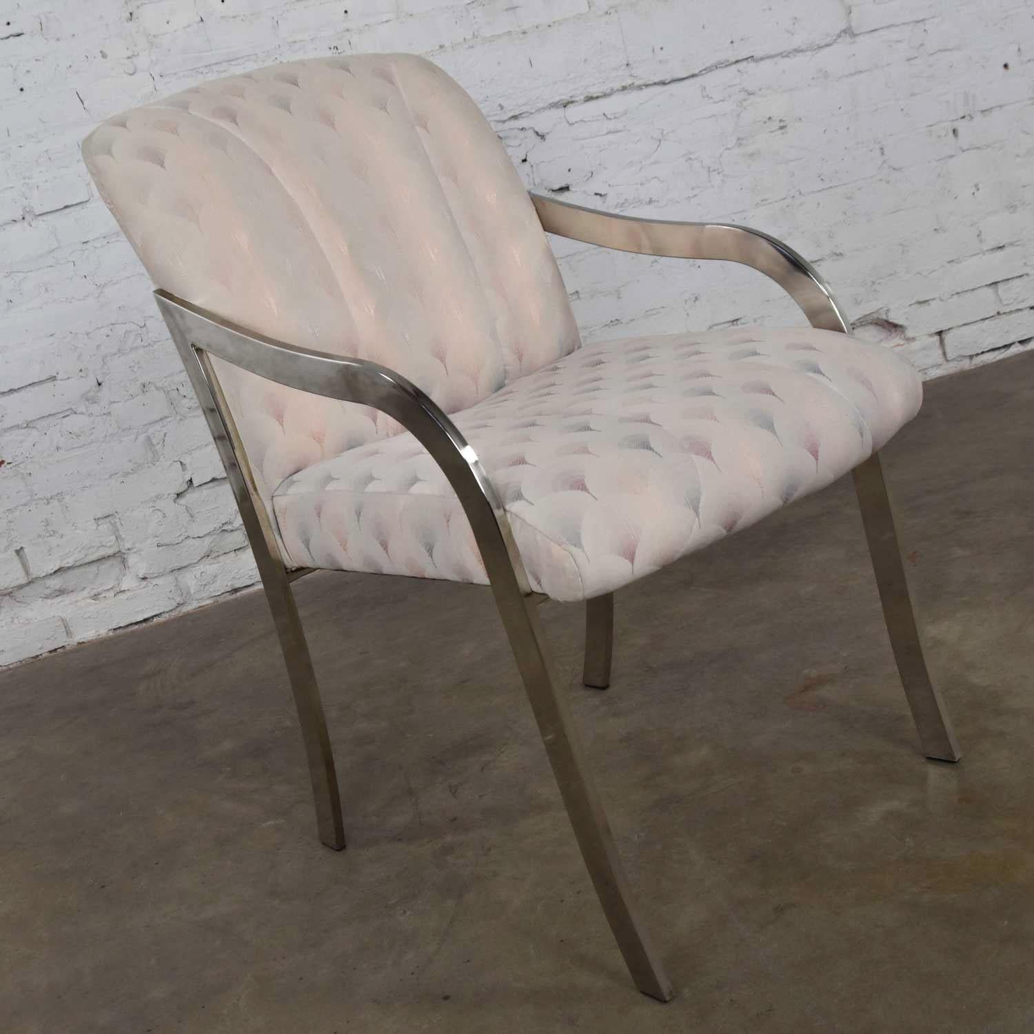 Handsome Art Deco Revival accent armchair in chrome rectangular tube with upholstered seat and back. It is in wonderful vintage condition with no outstanding flaws. The original vintage Art Deco Revival upholstery has been professionally cleaned and