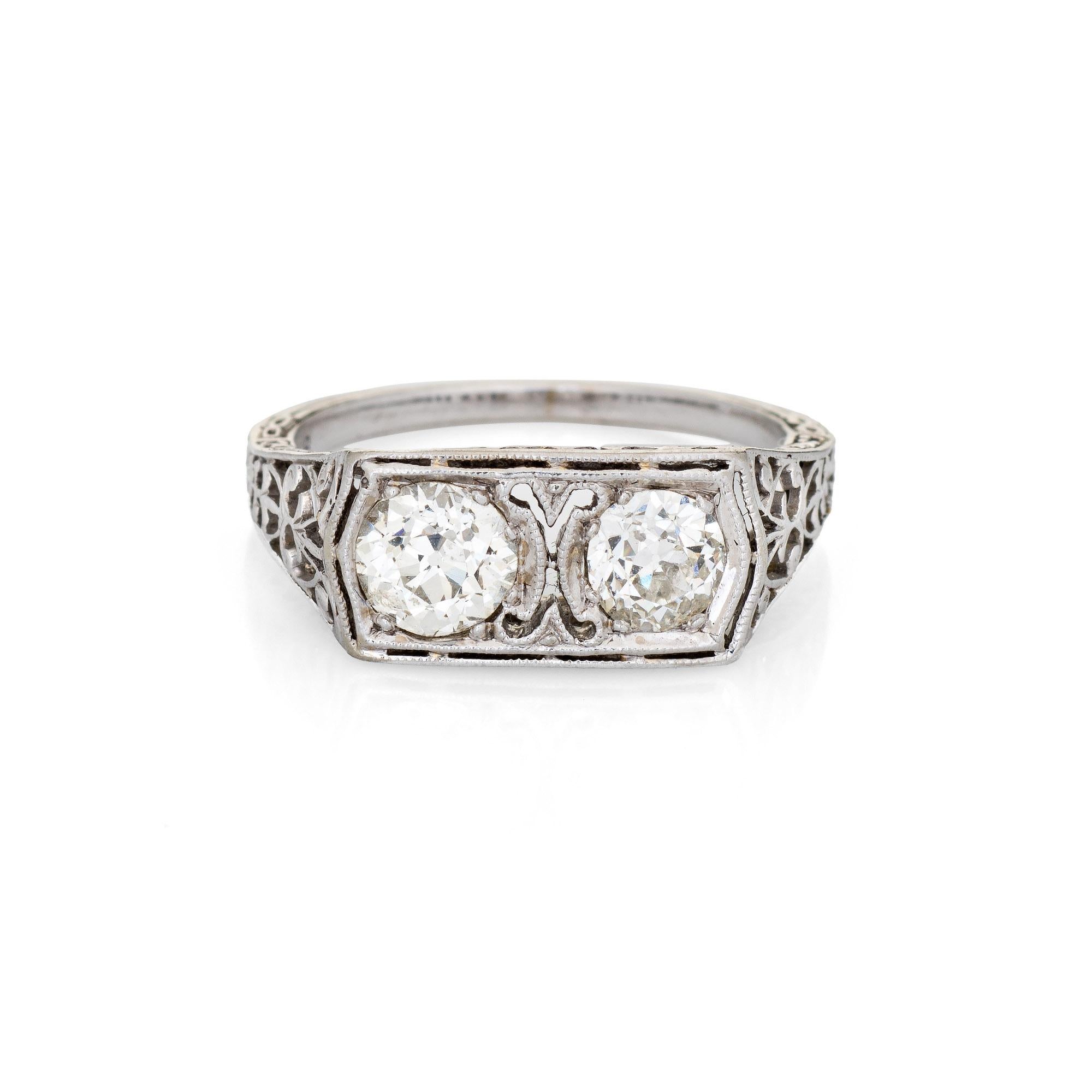 Finely detailed vintage Art Deco double diamond ring (circa 1920s to 1930s) crafted in 18k white gold.

Two old European cut diamonds are estimated at 0.62 carats each and total an estimated 1.25 carats (estimated at I-J color and VS2-SI1 clarity). 