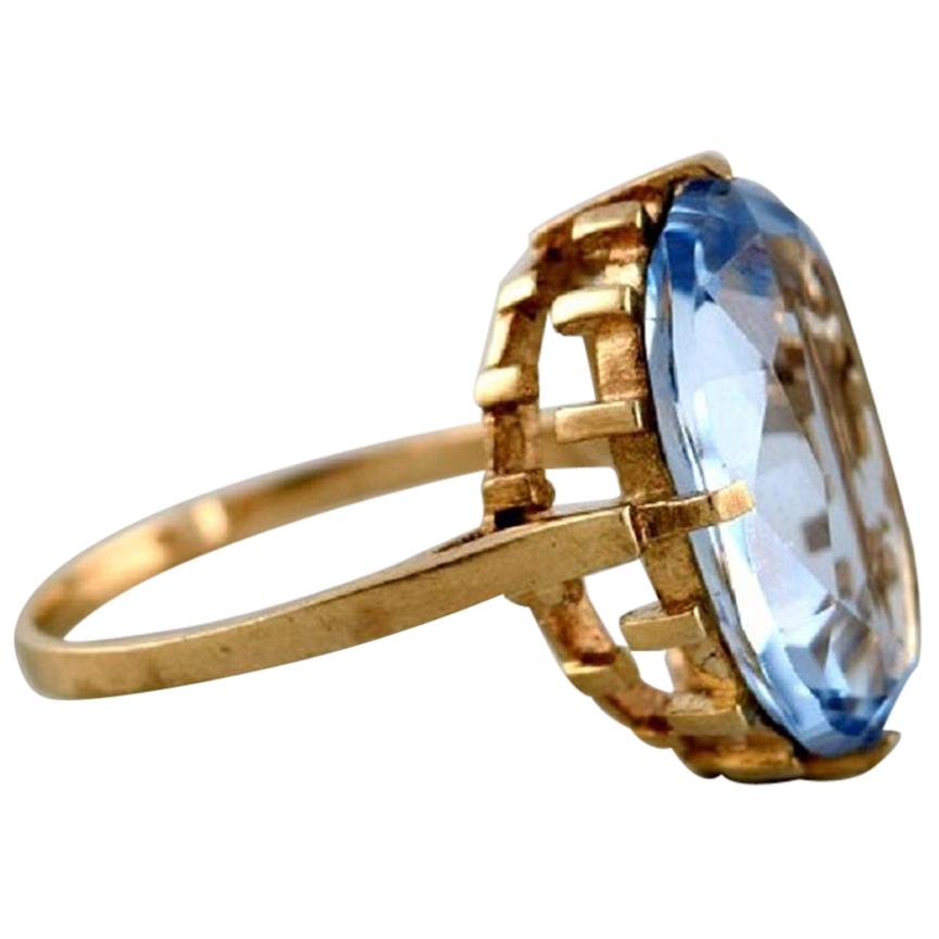 Vintage Art Deco Ring in 8 Carat Gold Adorned with Large Light Blue Stone