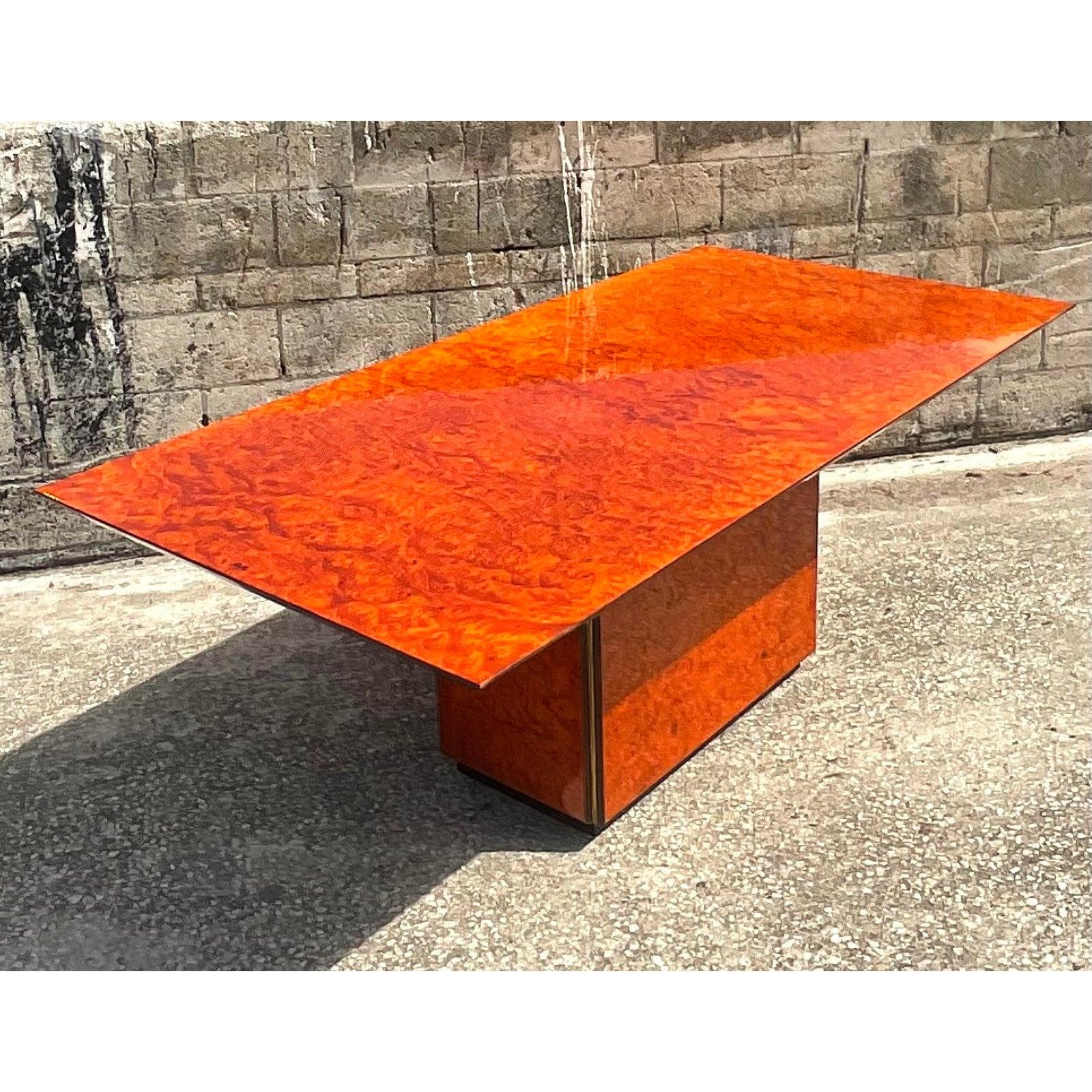 Fantastic vintage Lacquered Burl wood dining table. Made by the iconic Roche Bobois group. Incredible wood grain detail with a stacked pedestal. Matching credenza also available. Acquired from a Palm Beach estate.