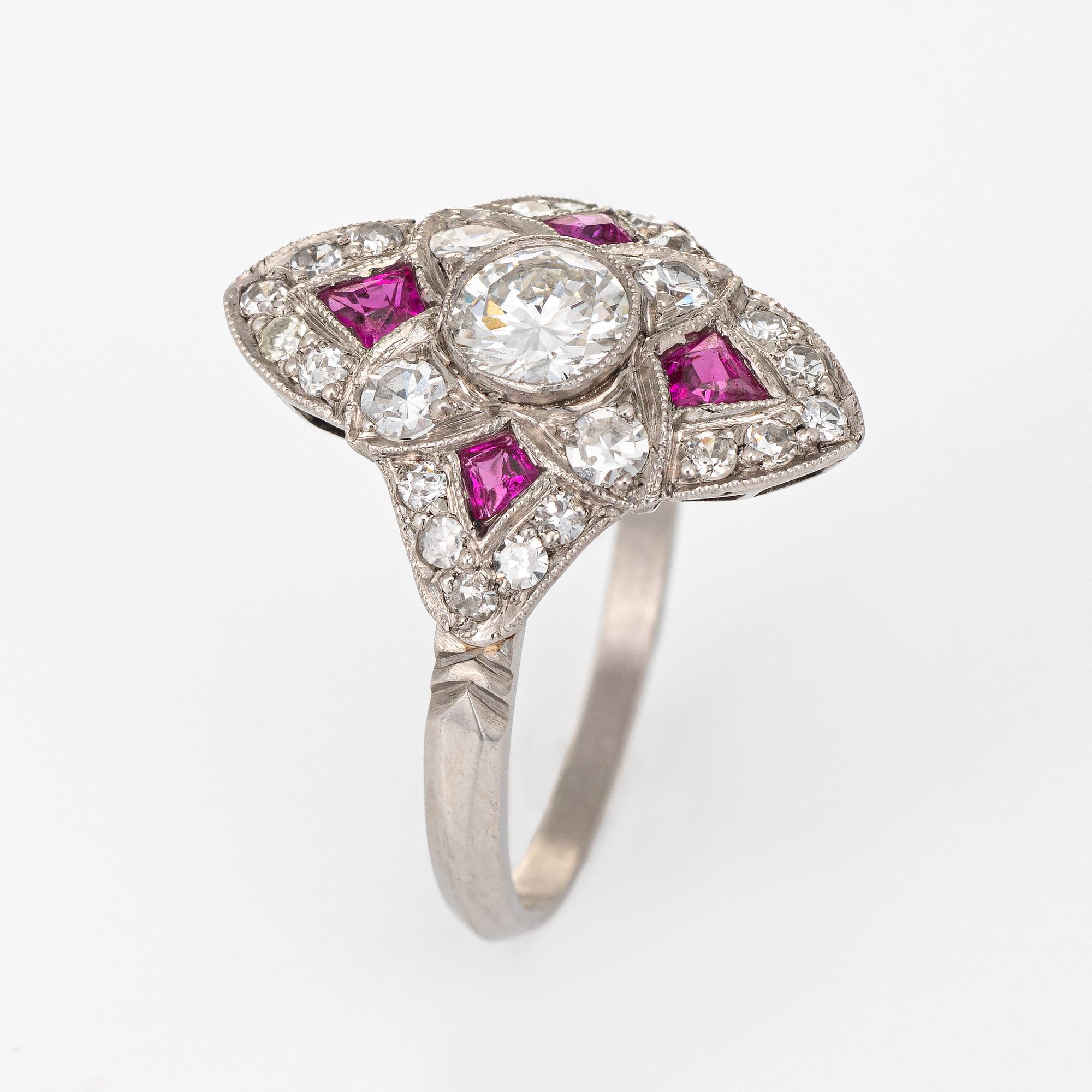 Elegant & finely detailed Art Deco era ring (circa 1920s to 1930s) crafted in 900 platinum. 

Centrally mounted estimated 0.50 carat transitional cut diamond is accented with a further 0.40 carats of diamonds (estimated at H-I color and VS2-SI1