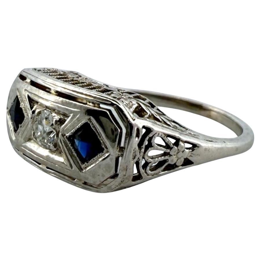 Anello da cocktail d
epoca in filigrana con zaffiro e diamante Belais