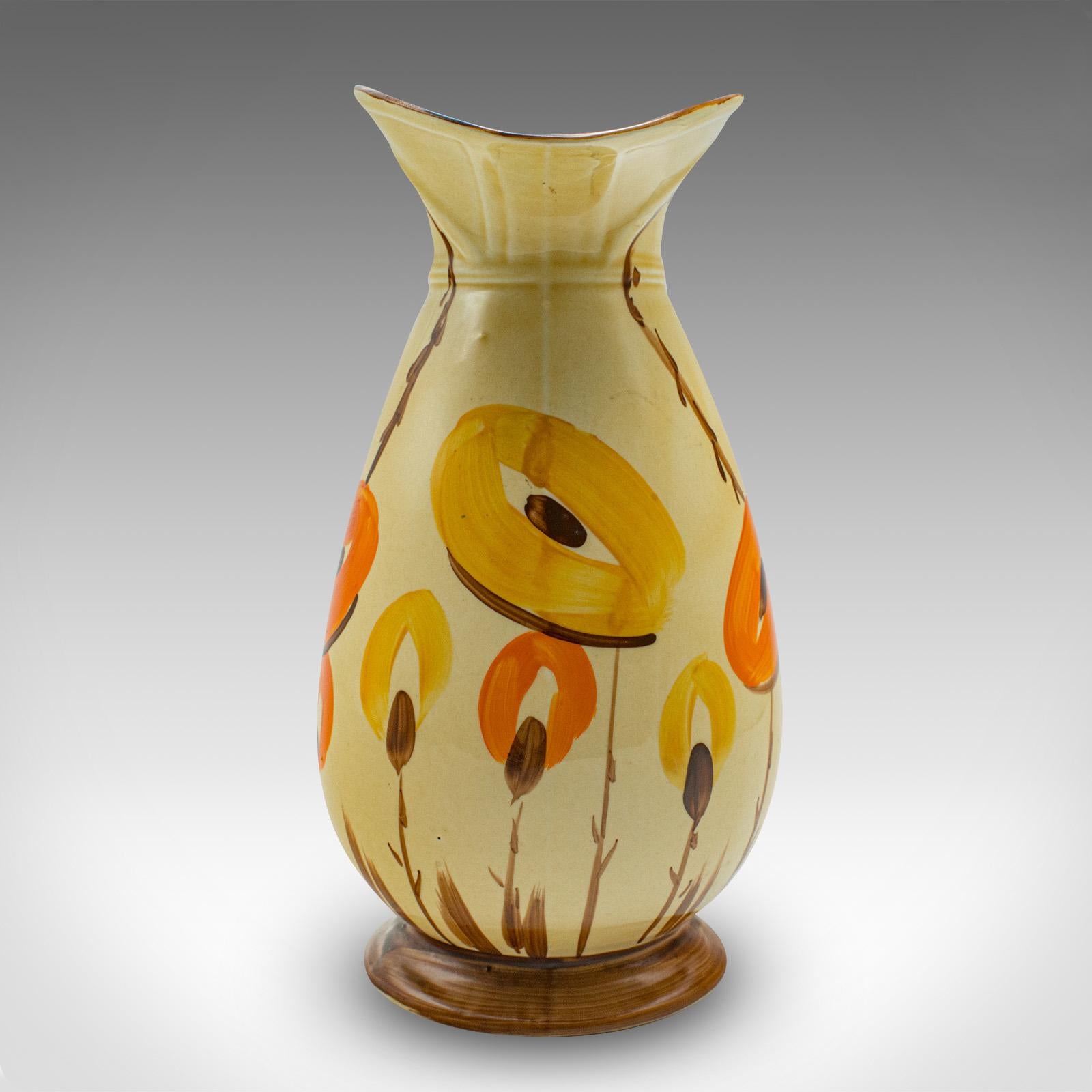 Our Stock # 24051

This is a vintage Art Deco pouring ewer. An English, hand painted ceramic serving jug, dating to the early 20th century, circa 1930.

Fascinating foliate decor accentuates this charming ewer
Displaying a desirable aged patina and
