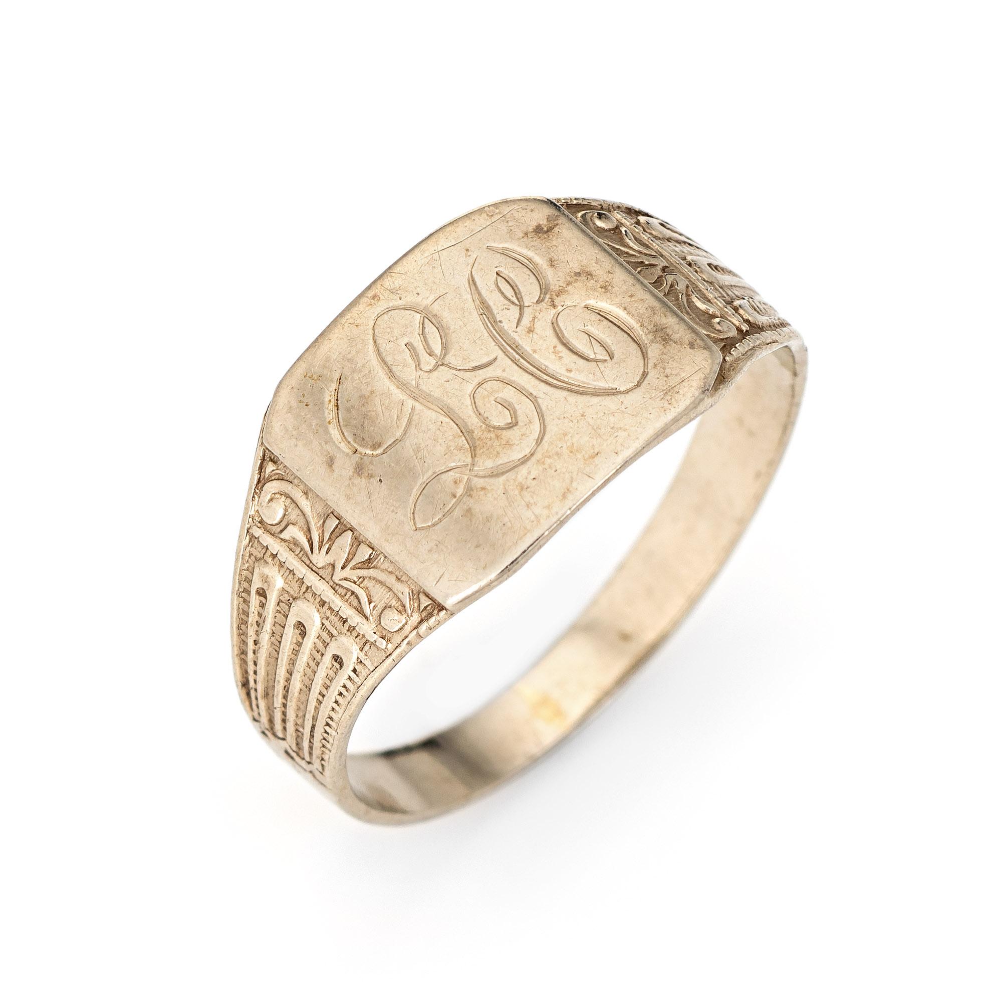 Finely detailed vintage Art Deco era signet ring (circa 1920s to 1930s) crafted in 14 karat white gold. 

The signet ring features a square mount with the engraved initials 