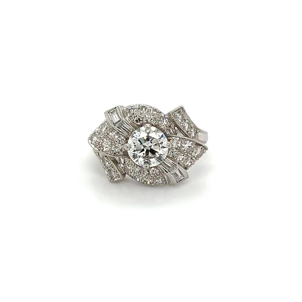 Vintage Art Deco Solitaire 1.20 Carat GIA and Baguette Platinum Diamond Ring In Excellent Condition For Sale In Montreal, QC