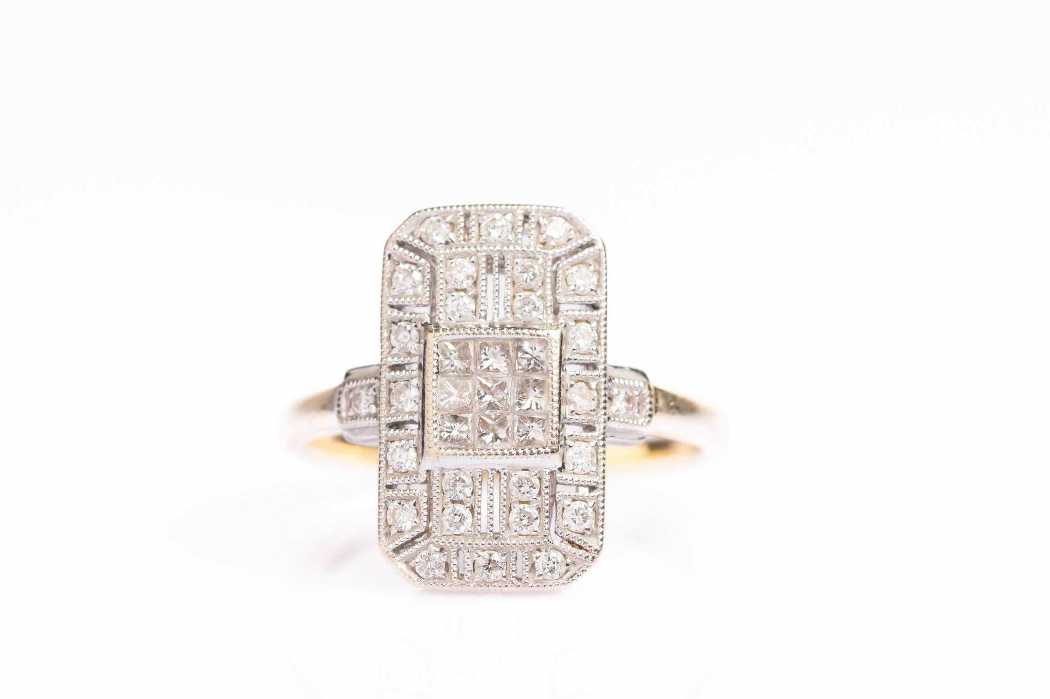 Attractive and elegant 18ct Gold Art Deco Style Diamond Plaque Ring. This beautiful ring is set with bright twenty four round brilliant-cut diamonds with migraine details around the head of the ring. The centre of the ring is decorated with nine