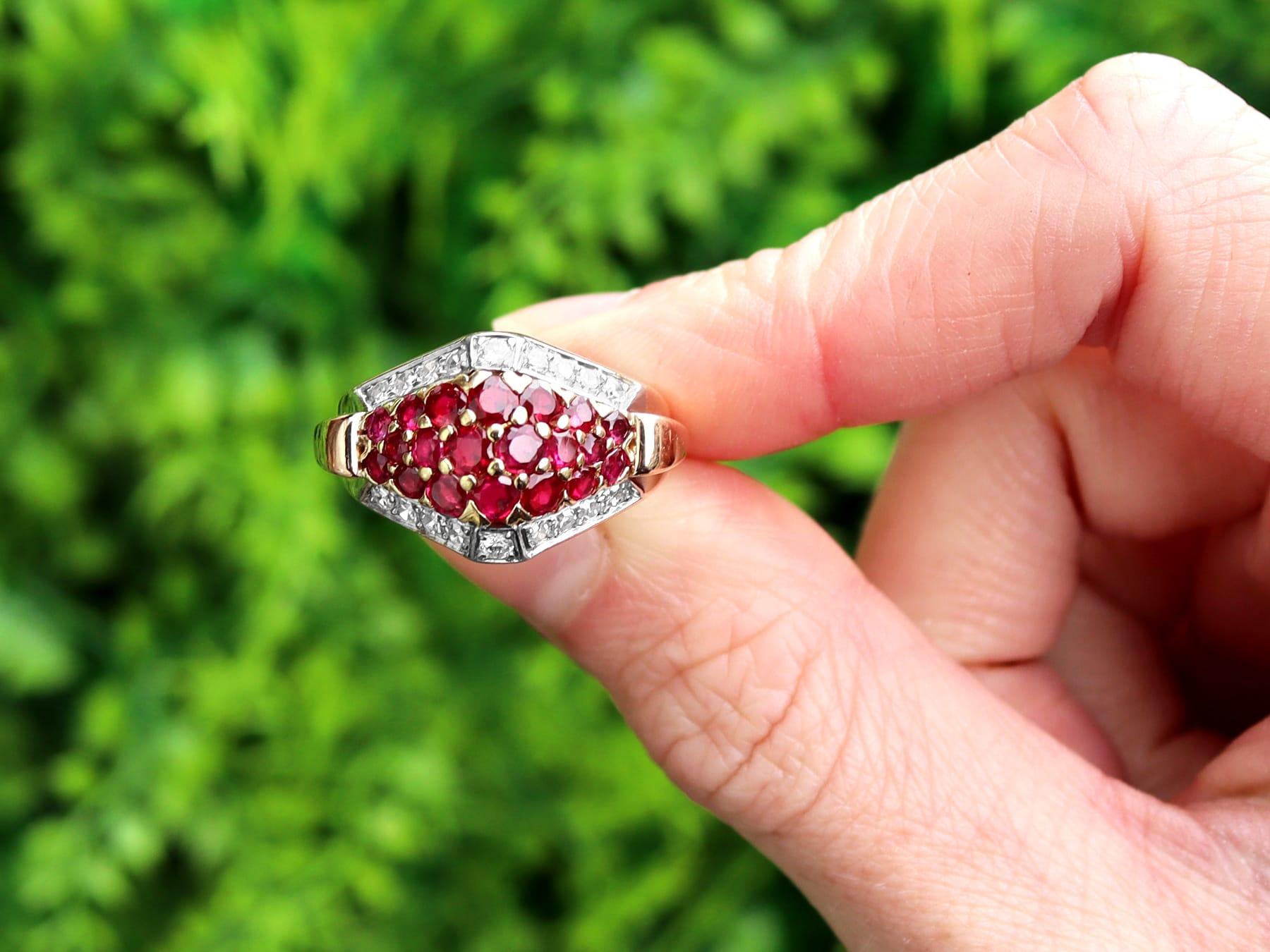 An impressive vintage Art Deco 1.38 carat ruby and 0.57 carat diamond, 14 karat yellow and white gold dress ring; part of our diverse vintage jewelry collections.

This fine and impressive vintage gold ruby dress ring has been crafted in 14k yellow