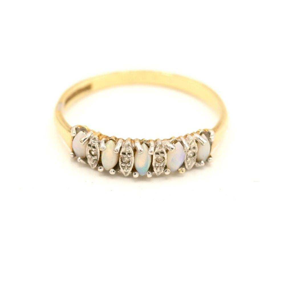 This stunning vintage Art Deco Style 9CT Gold Opal & Diamond Ring is made in Birmingham circa 1980 with opal gemstones and four little diamonds set in a 9ct gold ring you can wear on every occasion. An elegant and timeless piece. The ring will be