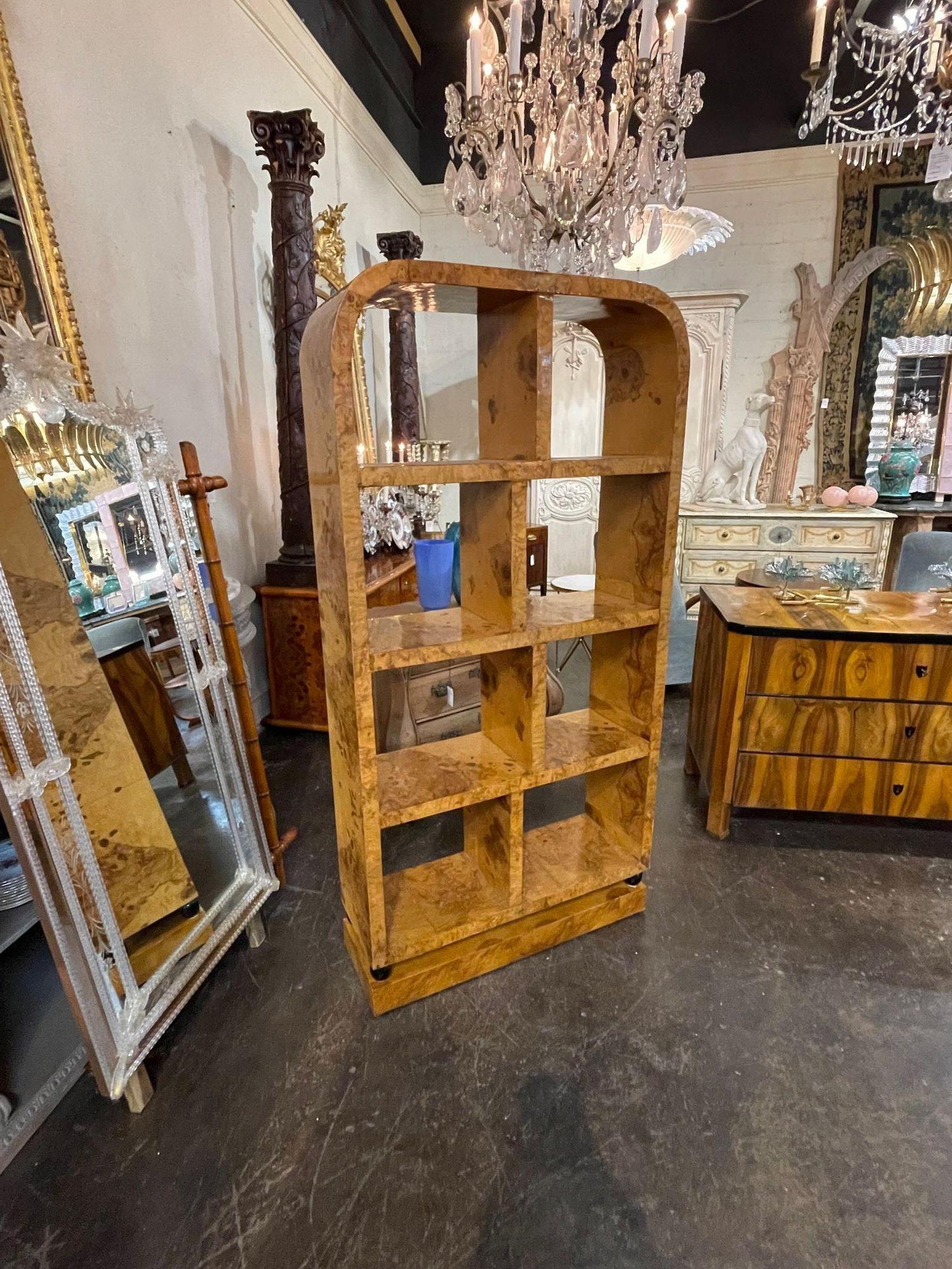 Stylish vintage Art Deco style burl walnut etagere shelf. Very nice finish on this piece. Makes a beautiful place to display books and art objects. Superb!