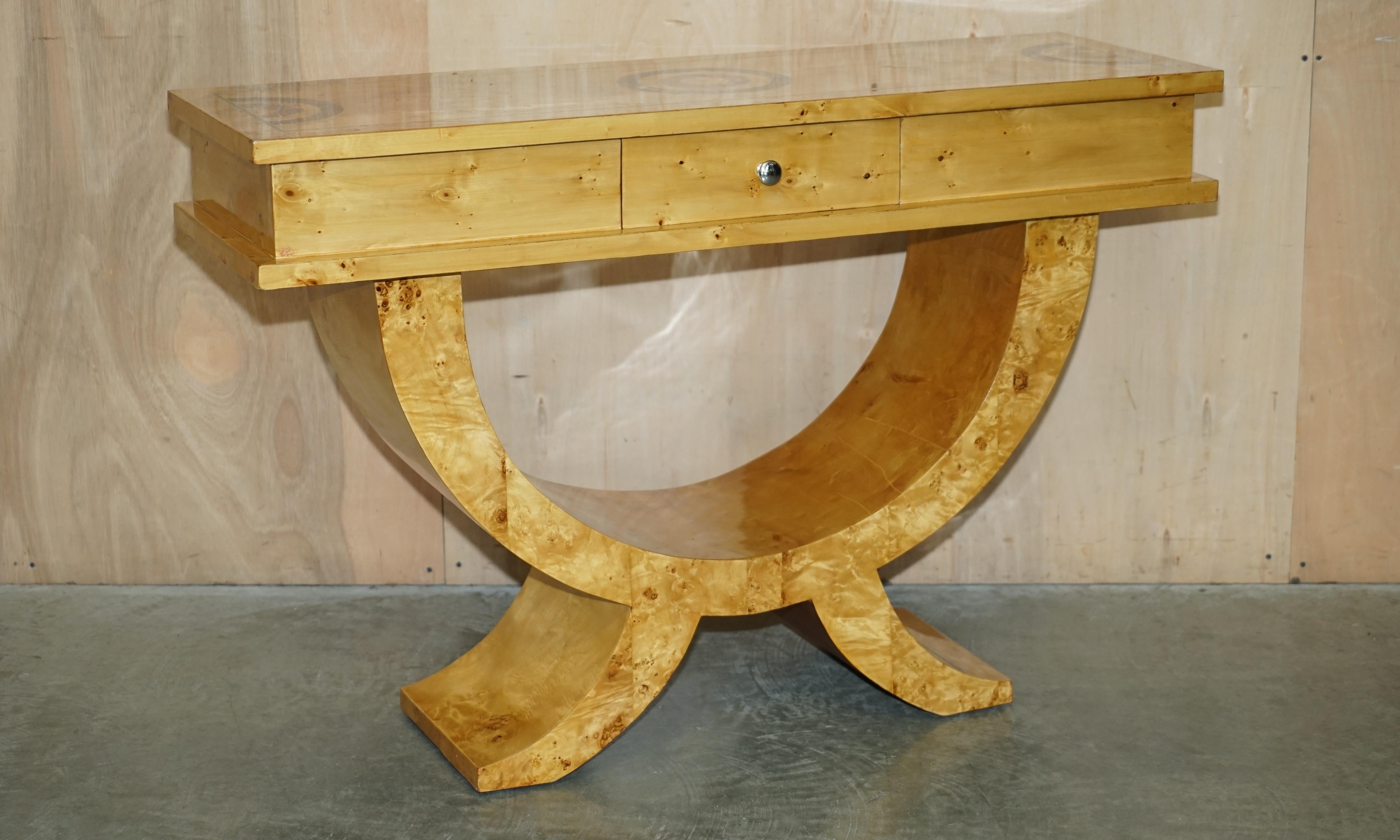 Royal House Antiques

Royal House Antiques is delighted to offer for sale this sublime Burr Walnut & Birch large console table with single drawer and very decorative top in the Art Deco style 

Please note the delivery fee listed is just a guide, it