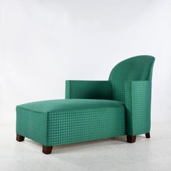 Vintage Art Déco style chaise longue with a green damask fabric