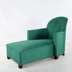 Vintage Art Déco style chaise longue with a green damask fabric
