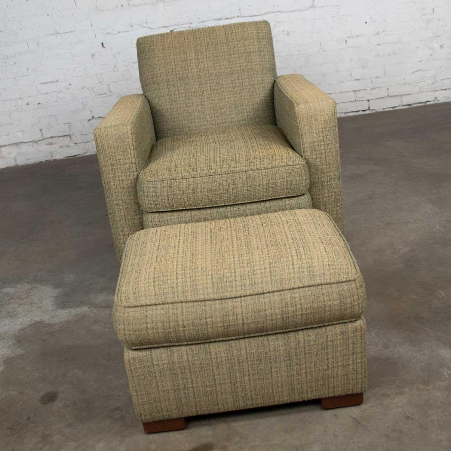Handsome Art Deco style club chair and ottoman by Hickory Chair in a green tweed like fabric. They are in fabulous vintage condition. They have been professionally cleaned and are ready to use. There is a bit of discoloration on the very top edges