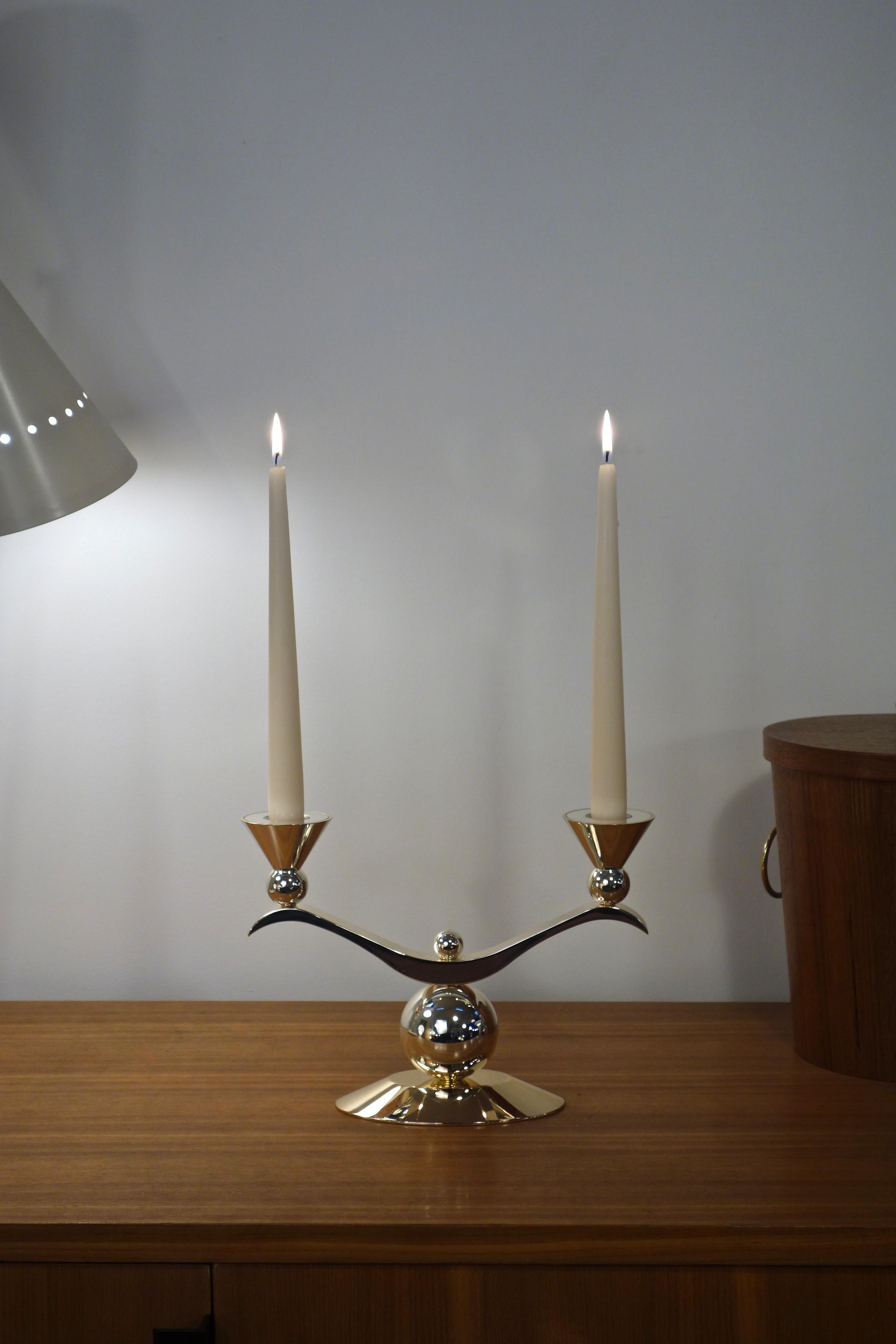 Art Deco style double candle holder in silver metal dating from the 1970s; French manufacturing of good quality, elegant and refined item. Candles will be provided. Beautiful state of conservation, this item has been cleaned by us. Beautiful patina,
