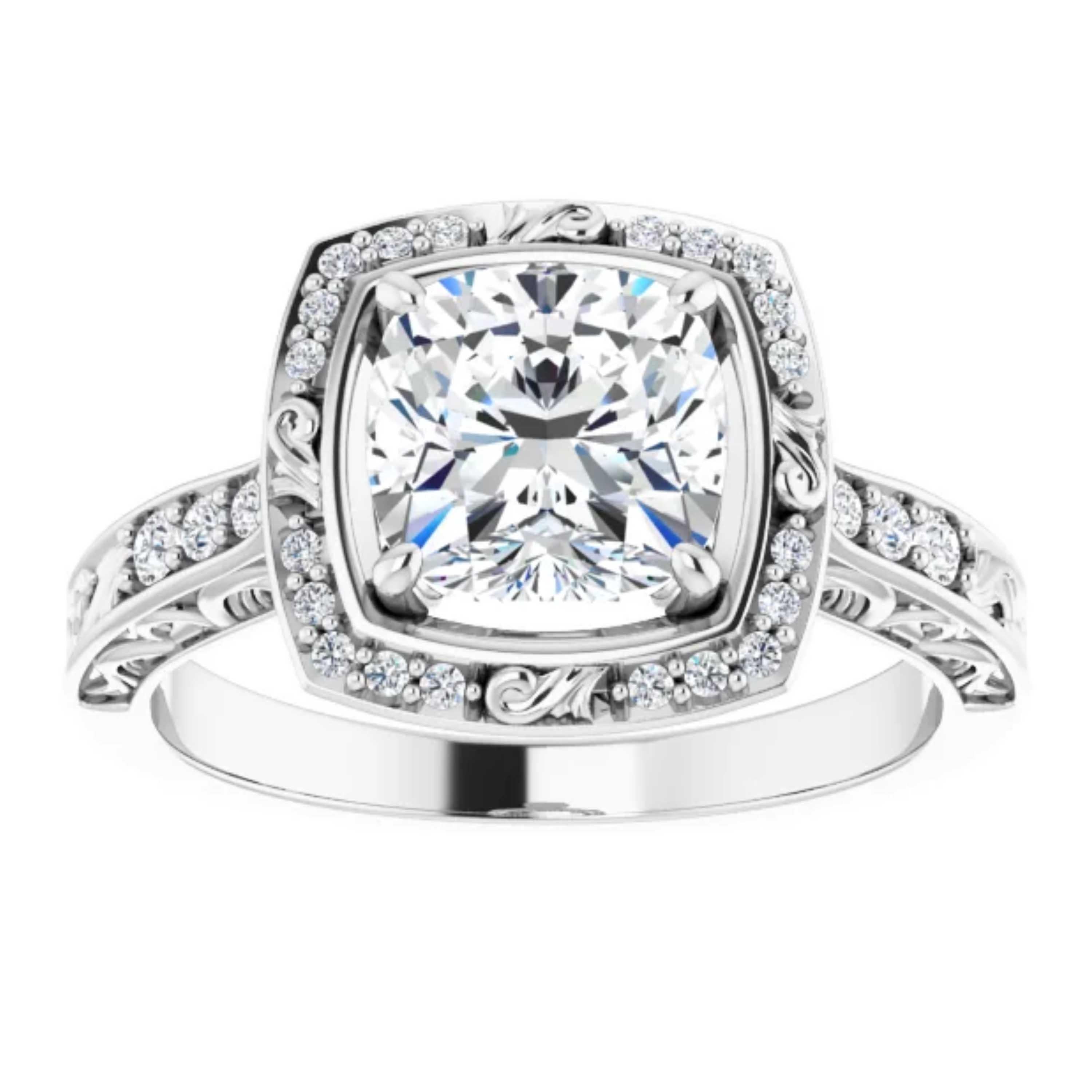 Intricate filigrees adorn the shank and halo of this vintage style GIA certified engagement ring. The cushion cut center diamond is amplified by a halo of shimmering natural white diamonds. Additional diamonds float along the shank. Handcrafted in