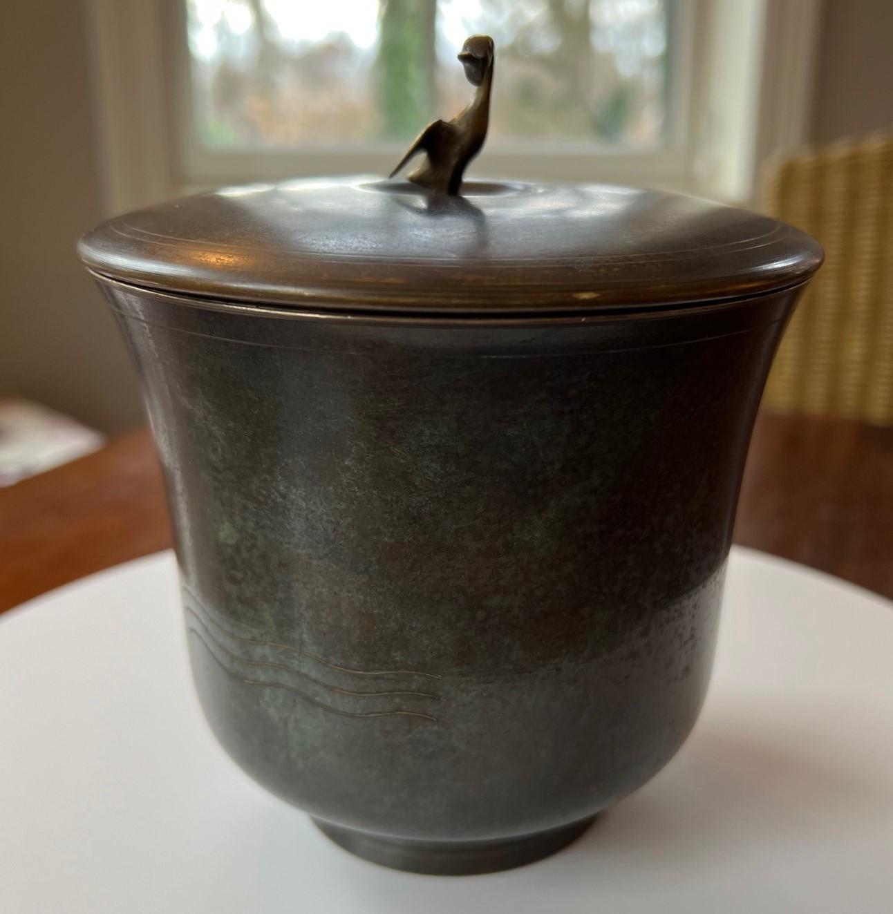 A vintage art deco style lidded bowl in the style of Carl Sorensen stamped 
