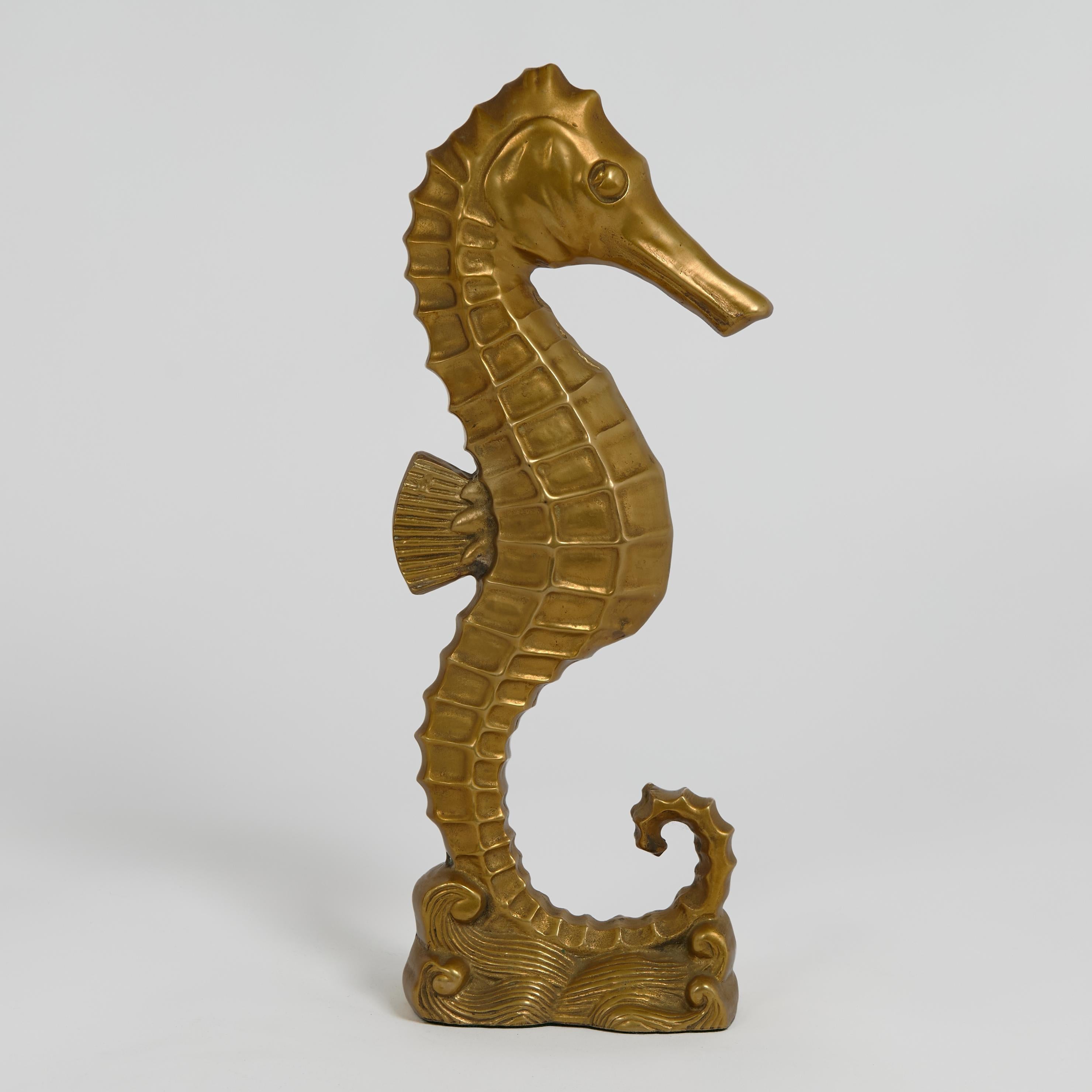 Charming mid century seahorse sculpture or figure crafted in bronze in an Art Deco form with a custom acid washed finish. 