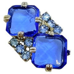 Vintage Art Deco style silver tone sapphire glass designer brooch