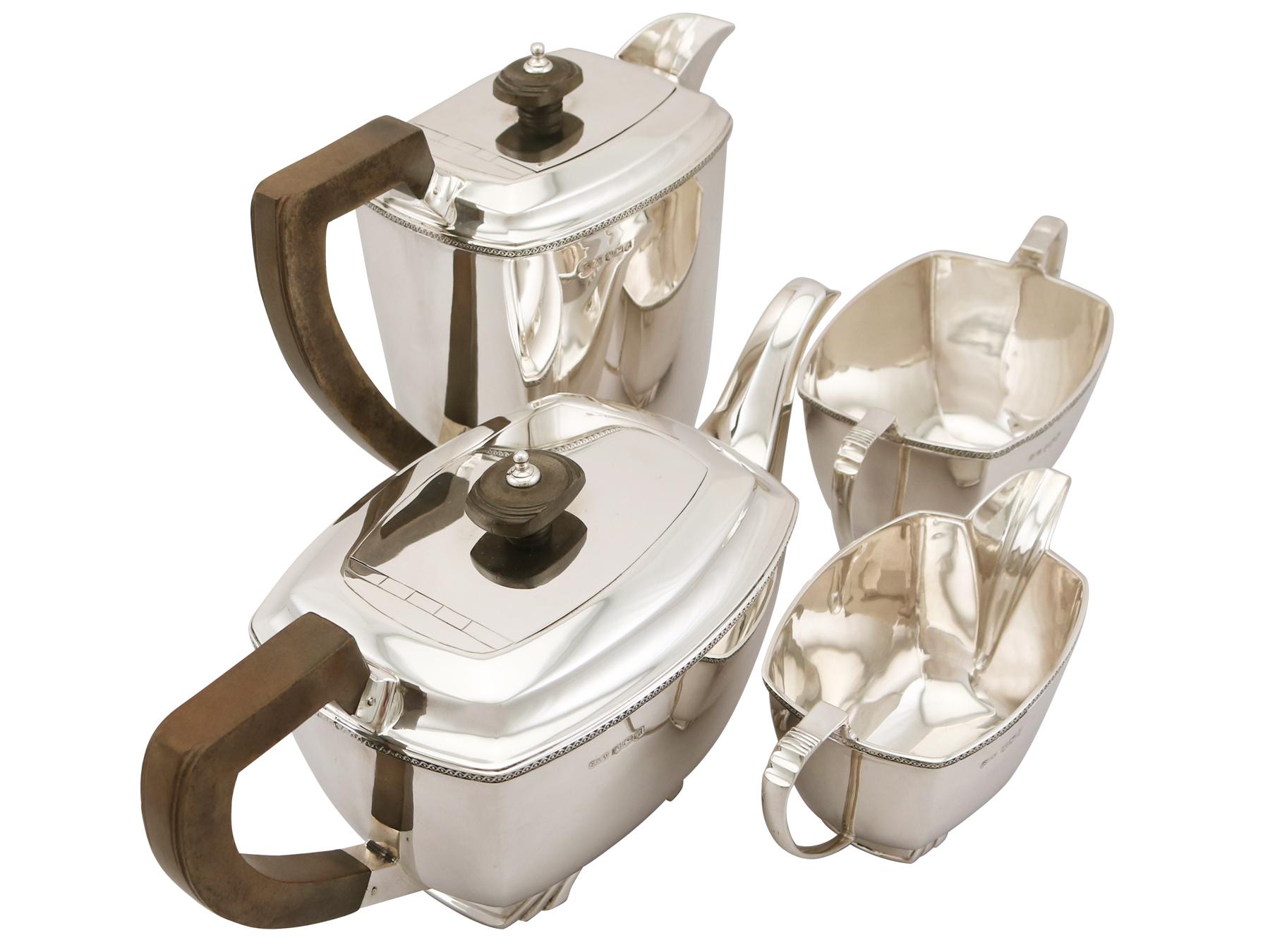 A fine and impressive vintage George VI English sterling silver four-piece tea and coffee service in the Art Deco style; an addition to our silver teaware collection.
This fine vintage George VI sterling silver four piece tea and coffee service/set