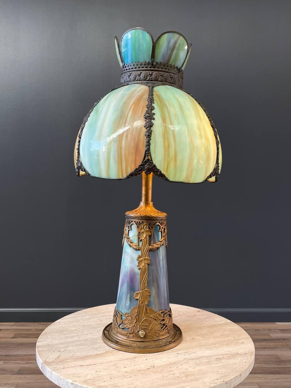 Original Vintage Condition

Dimensions: 25”H x 12”W x 12”D

Materials: Patinated Brass, Resin Plastic Shade