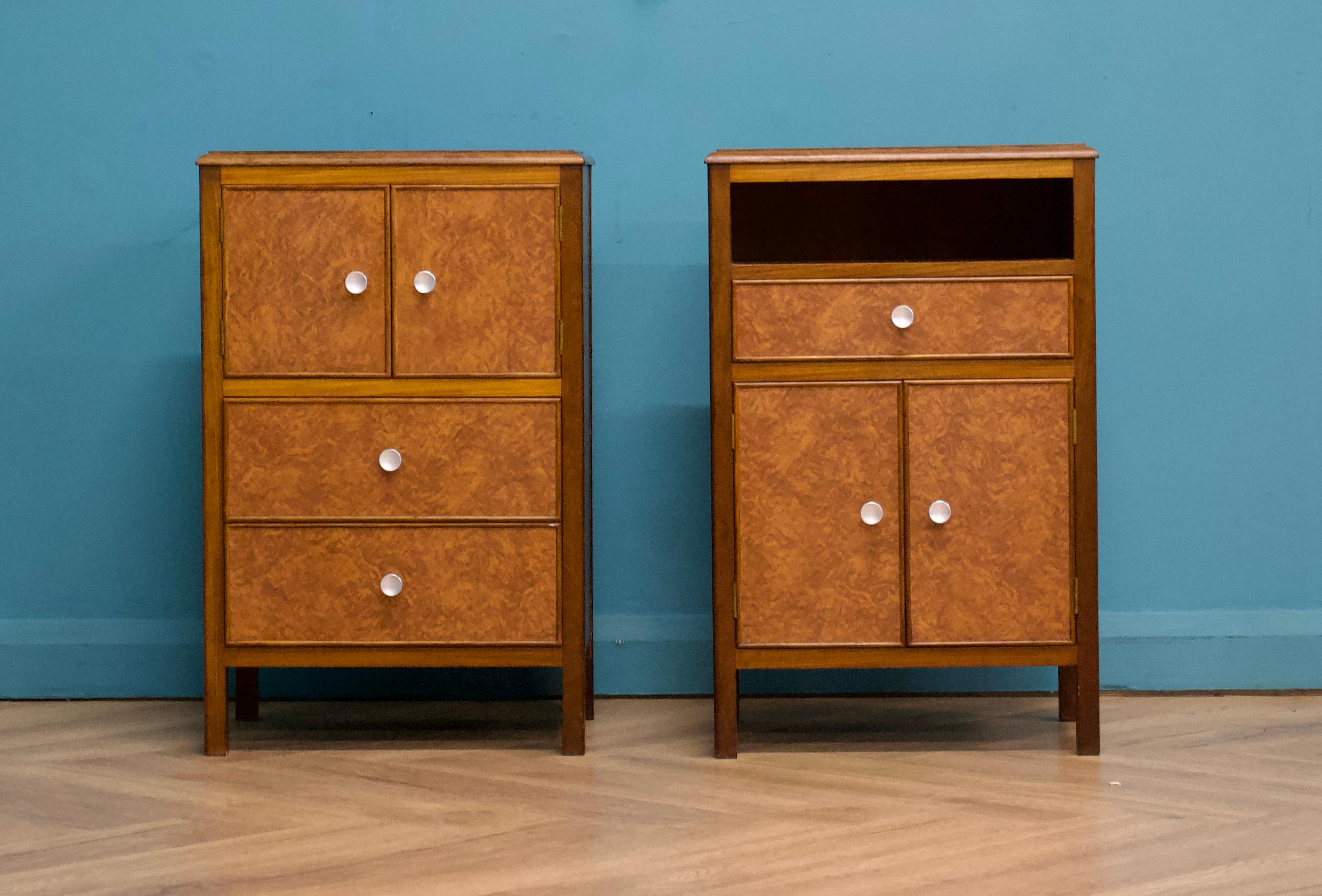 A beautiful quality vintage pair of teak and walnut effect formica bedside tables
One has a cupboard and two drawers, the other has a cupboard, a drawer and compartment