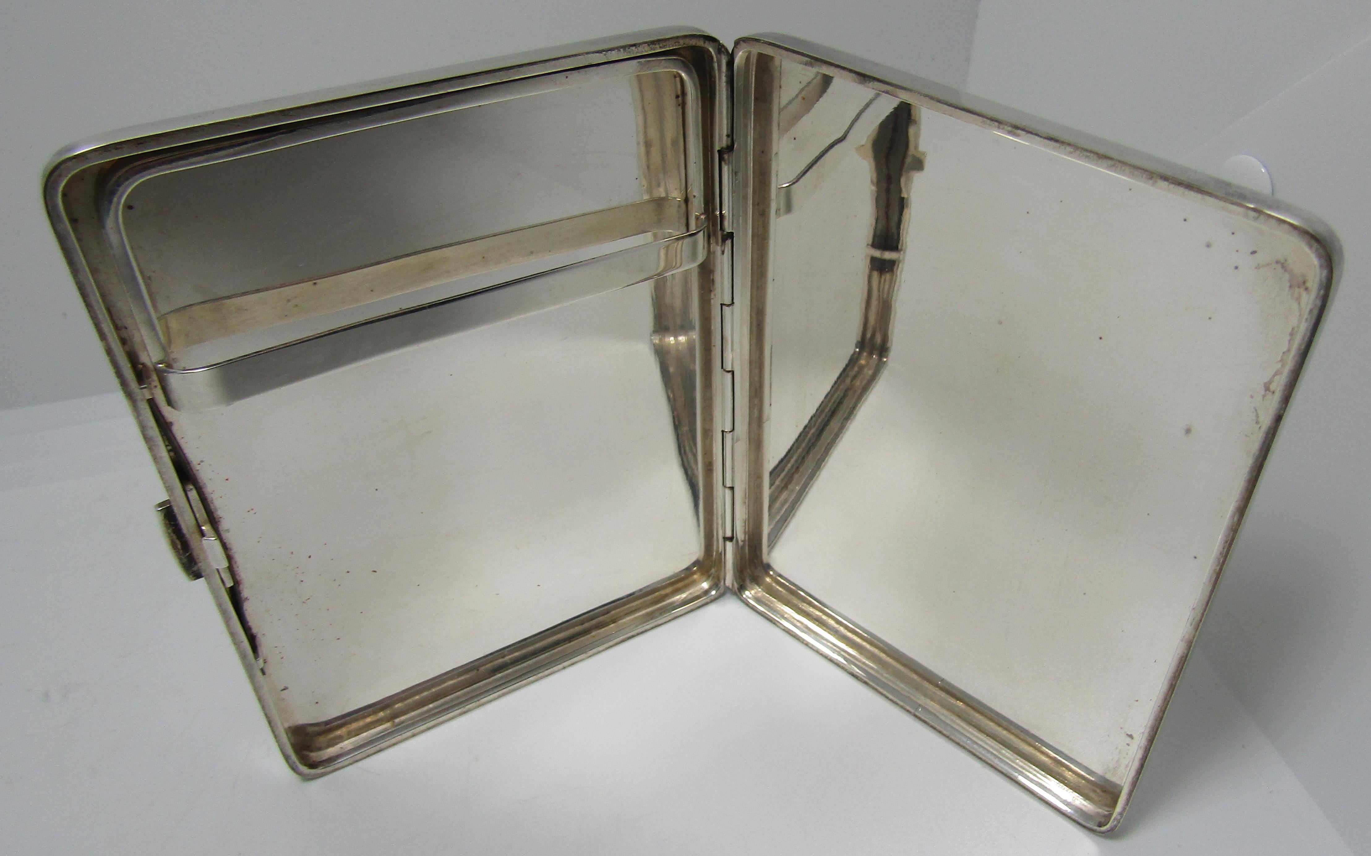 This Vintage Art Deco Tiffany & Co Solid Sterling Silver Cigarette Case From Italy was made circa 1925 and is in excellent, used condition. It is signed Tiffany & Co, 925, made in Italy. It measures 4.5