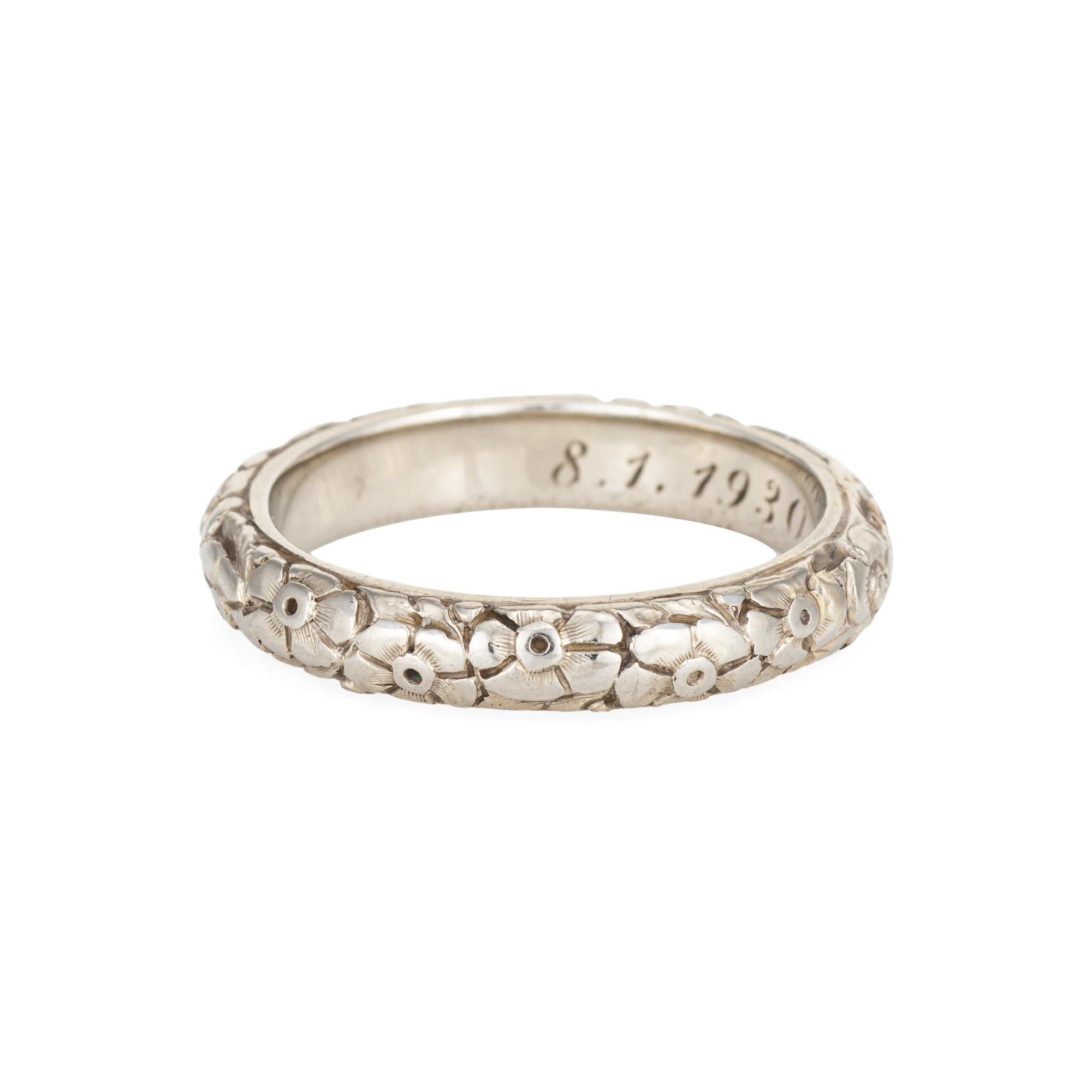 Elegant vintage Art Deco era band (circa 1930) crafted in 14k white gold. 

The ring epitomizes vintage charm and would make a lovely wedding band. Also great worn alone or stacked with your jewelry from any era. The inner band is engraved