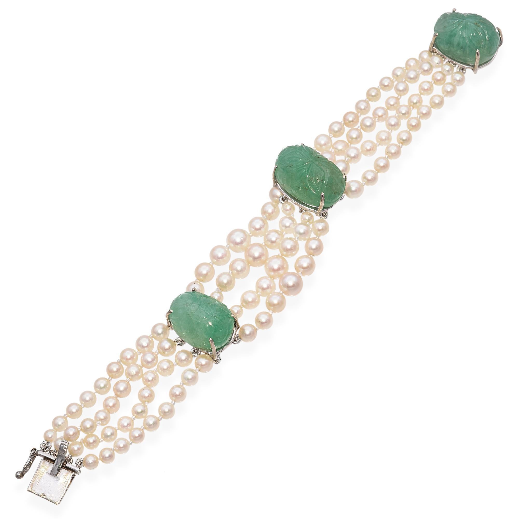Elegant Art Deco Pearl and Jade Bracelet. This exquisite bracelet features white pearls with excellent luster intricately strung in three rows. The pearls are complemented by striking carved green jade cabochons, each securely set in gold. The