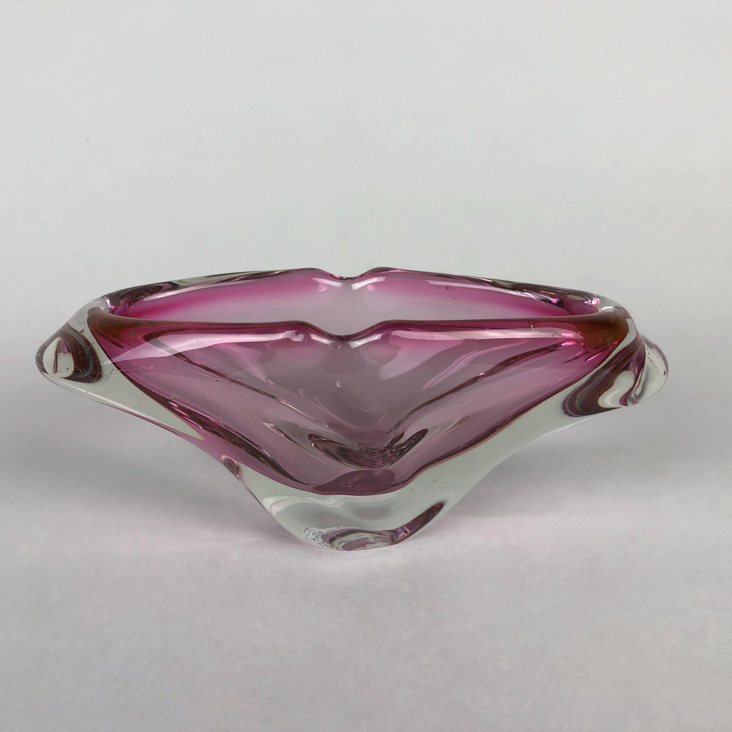 Vintage art glass ashtray. Heavy pink / purple glass. Good vintage condition with just some signs of use.
