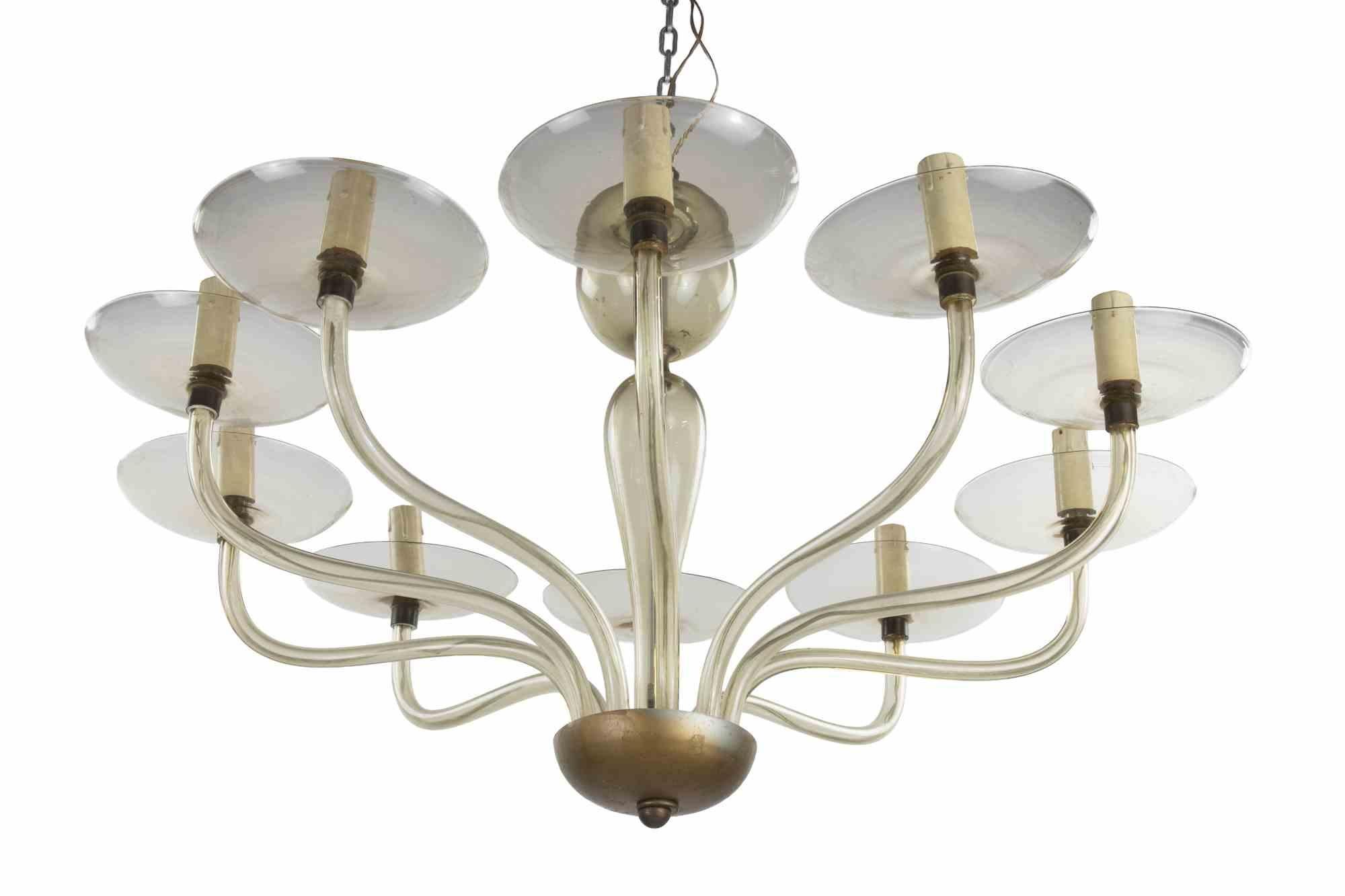 Lampadario d'epoca in vetro artistico attribuito a Venini, realizzato negli anni Cinquanta.

10 luci.

Ottime condizioni.