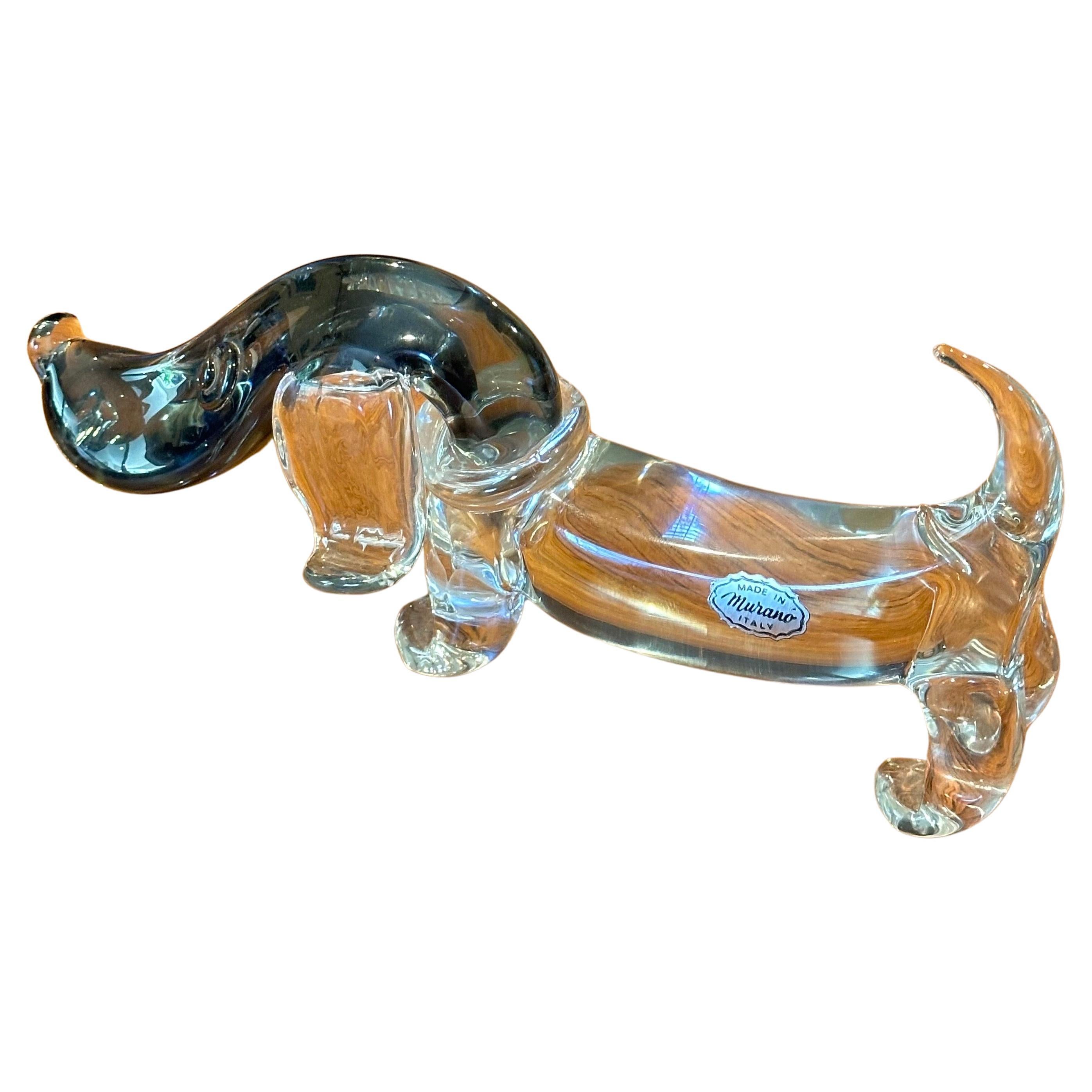 A wonderful vintage whimsical art glass dachshund dog sculpture by Archimede Seguso for Murano Glass, circa 1970s. The piece is in very good vintage condition and measures 11.5