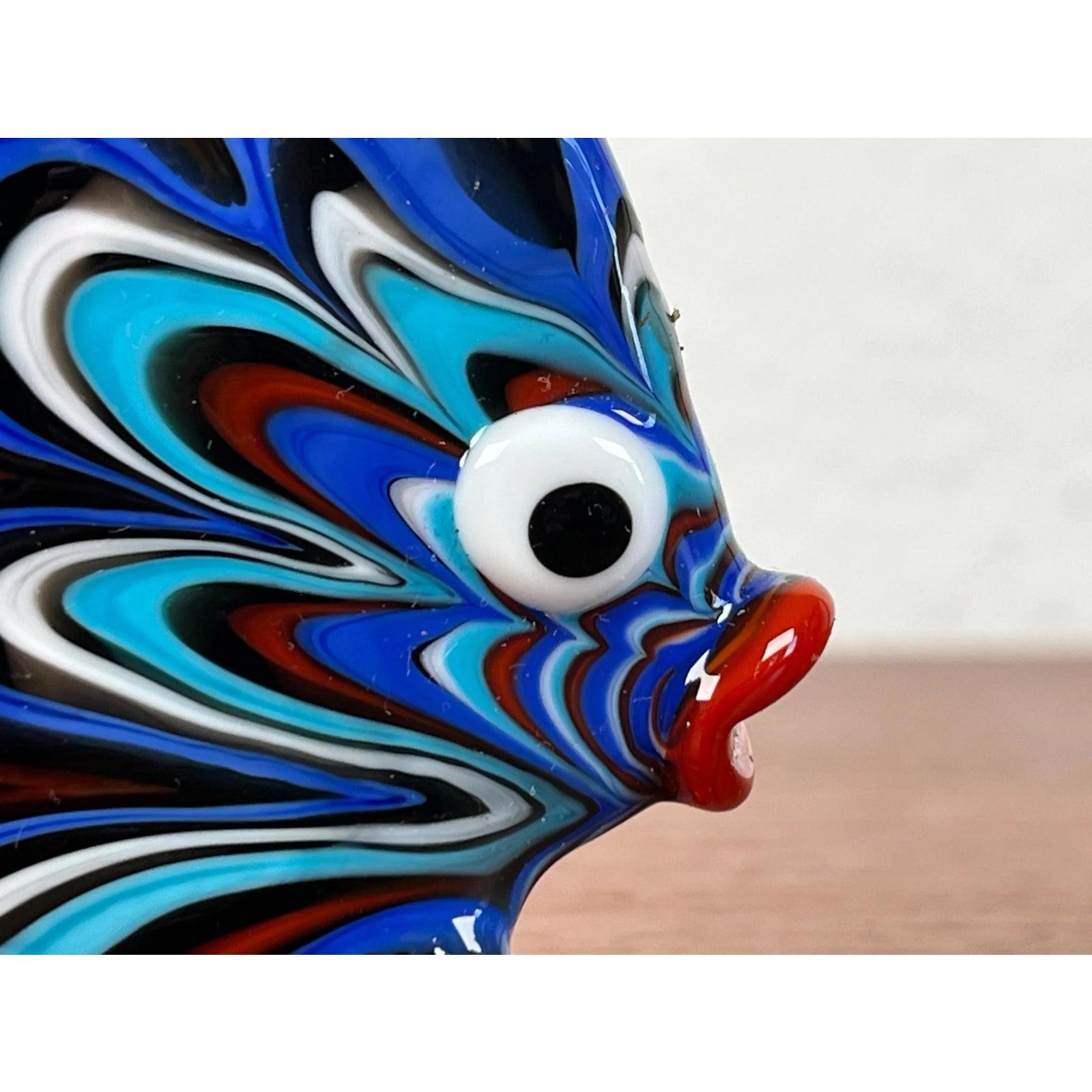 Vintage Art Glass Fish Figurine, 1970s, in Very Good conditions. Designed 1970 to 1979.

Additional information:
Materials: Glass
Color: Blue
Item Type: Vintage, Antique or Pre-owned
Dimensions: 3.15ʺW × 1.57ʺD × 4.72ʺH
Condition: Some
