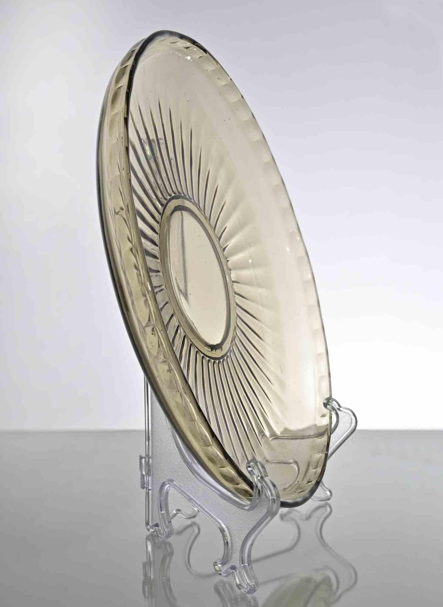 Piatto in vetro artistico vintage realizzato in Italia nel 1970.

Beige trasparente con sfumature gialle

Ottime condizioni.